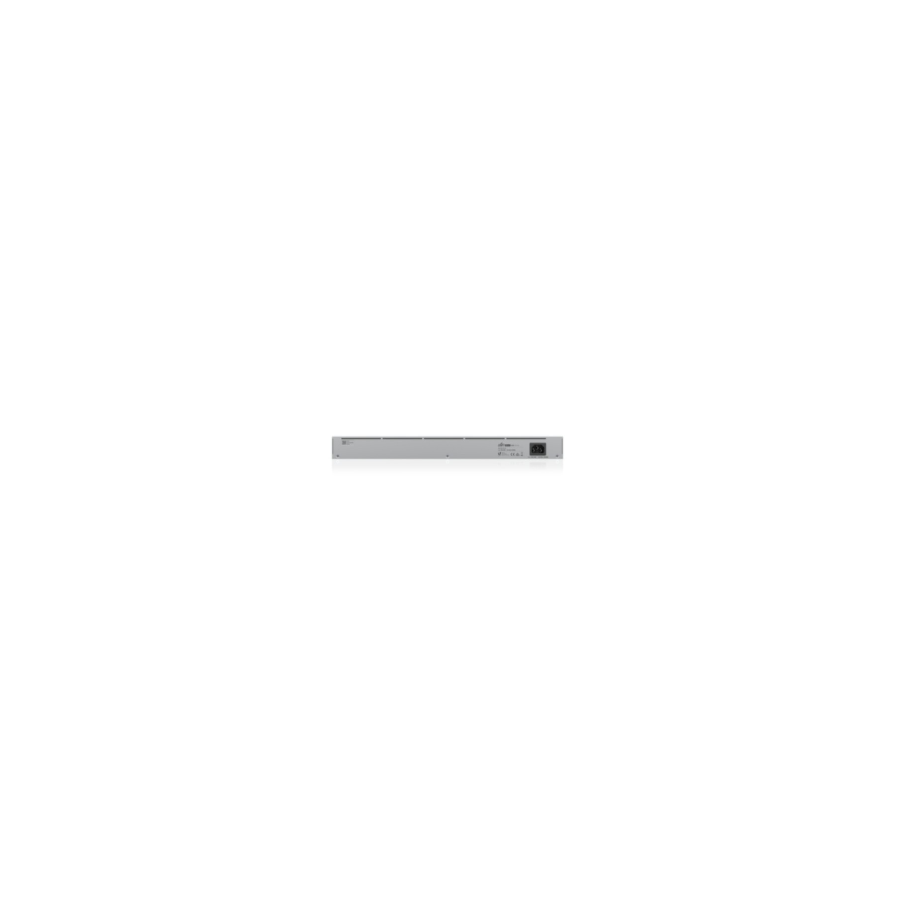 A gray network switch is centered against a white background. It has several ports and a power connector.