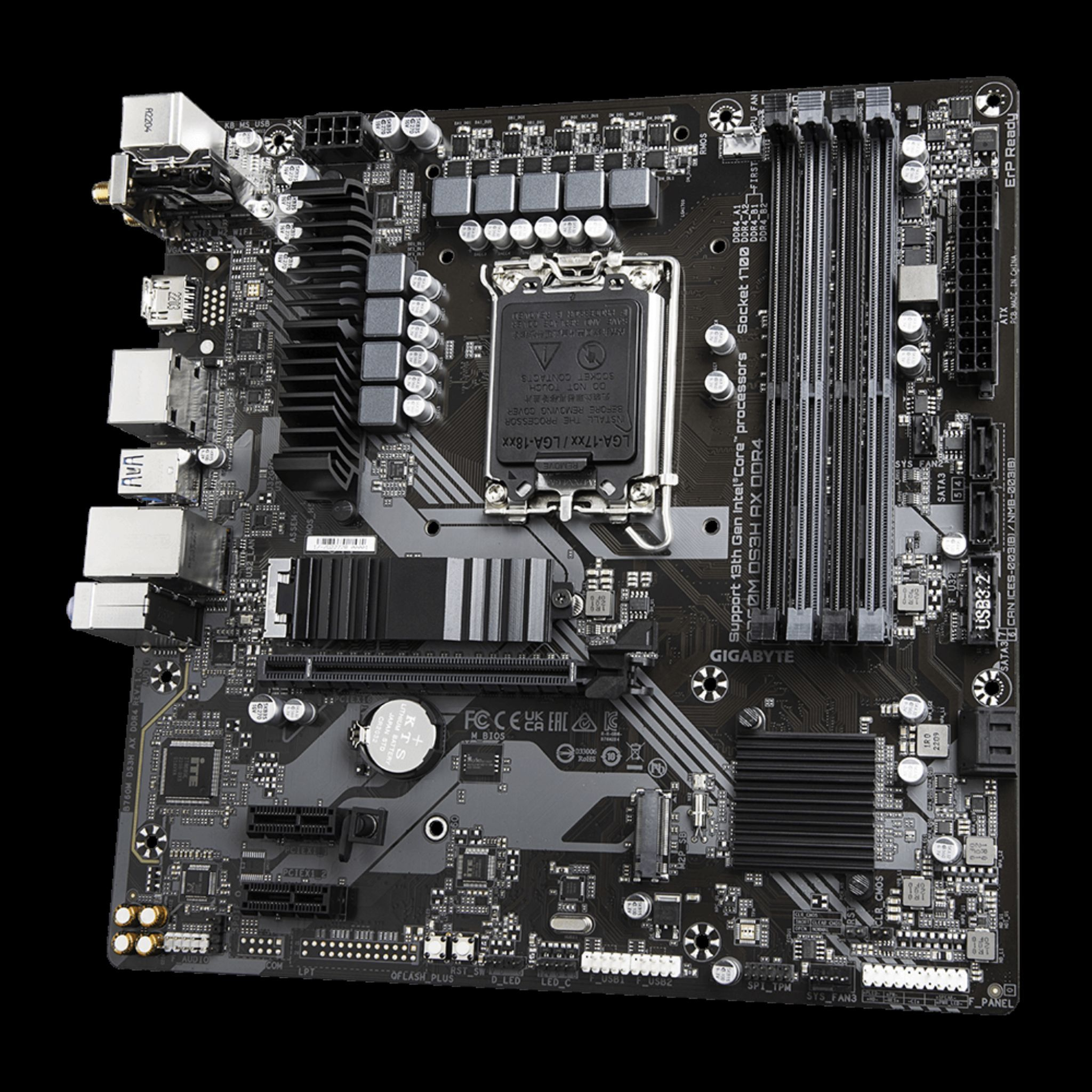 Una scheda madre Gigabyte nera con vari componenti come slot RAM, un socket CPU e connettori, su sfondo nero.