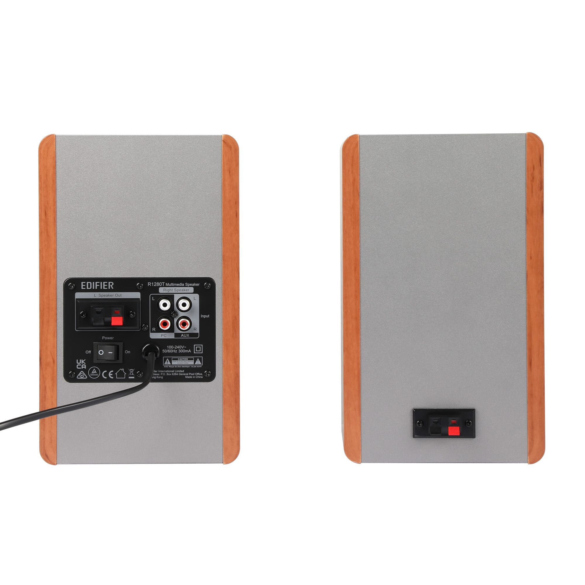 Dwa głośniki Edifier R1280T. Jeden pokazuje wejścia, włącznik i wyjście głośnikowe. Drugi ma wyjście głośnikowe.
