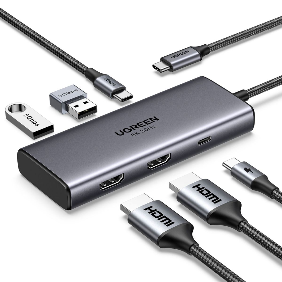 Ein UGREEN-Hub mit HDMI- und USB-Anschlüssen, USB-Laufwerken und Kabeln. Grau- und Schwarztöne dominieren.