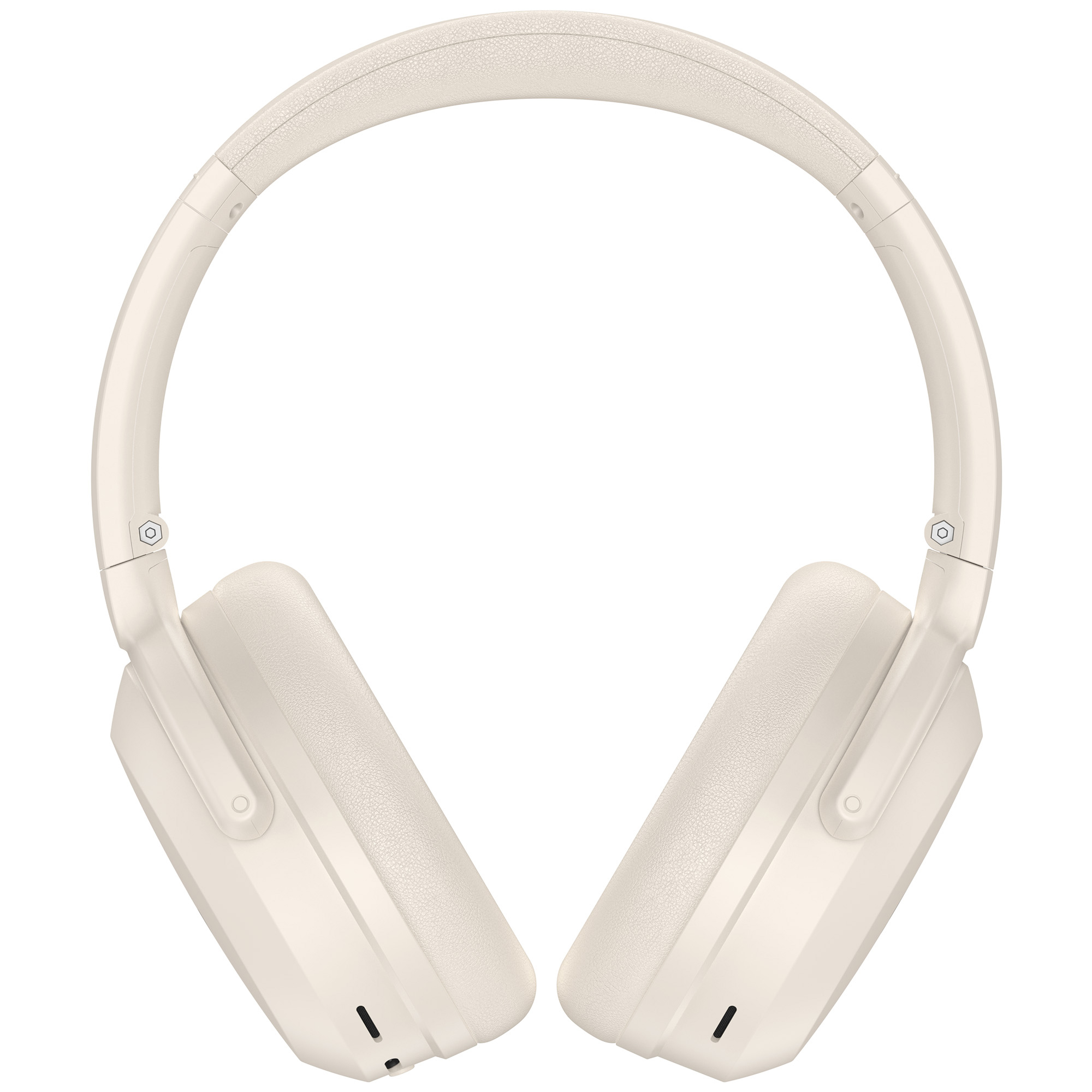 Kremowe słuchawki, wyśrodkowane na białym tle. Słuchawki mają duże nauszniki i wyściełany pałąk.