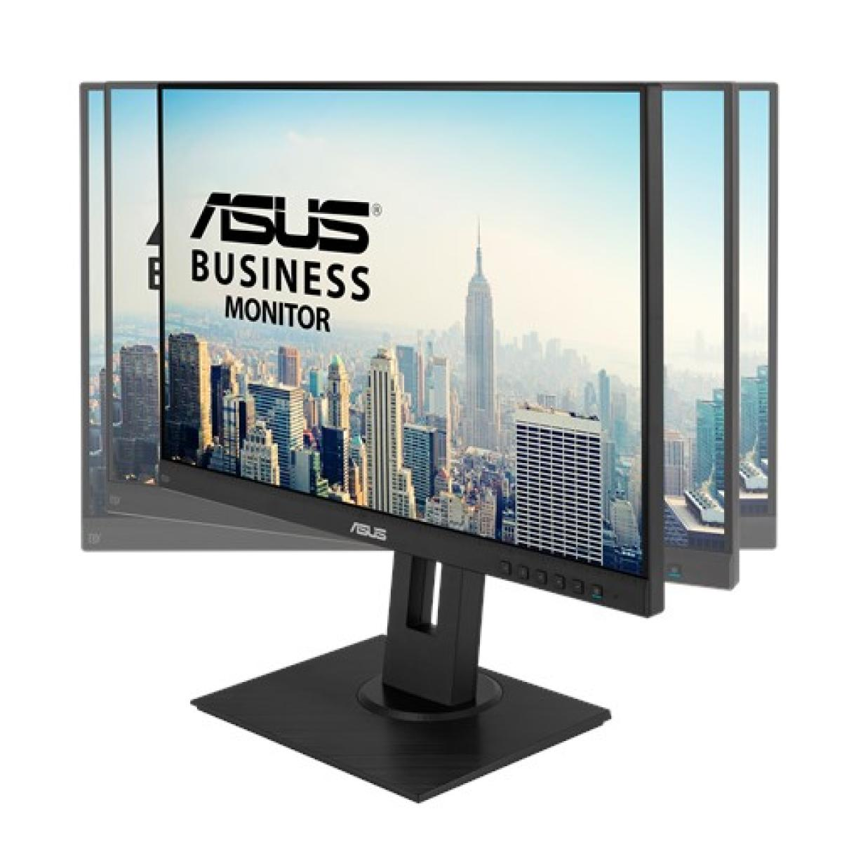 Un moniteur professionnel ASUS affiche un paysage urbain. Le moniteur est noir avec une base carrée. L'écran affiche le logo ASUS.