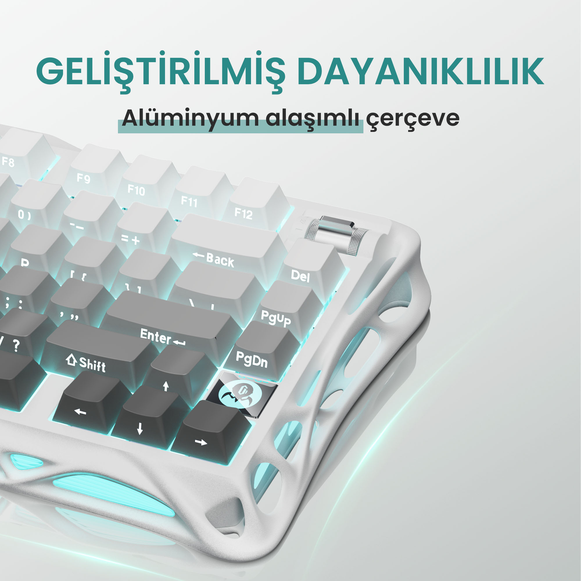 Biało-szara klawiatura o unikalnym designie. Klawisze podświetlane są na turkusowo. Rama wykonana jest z aluminium.