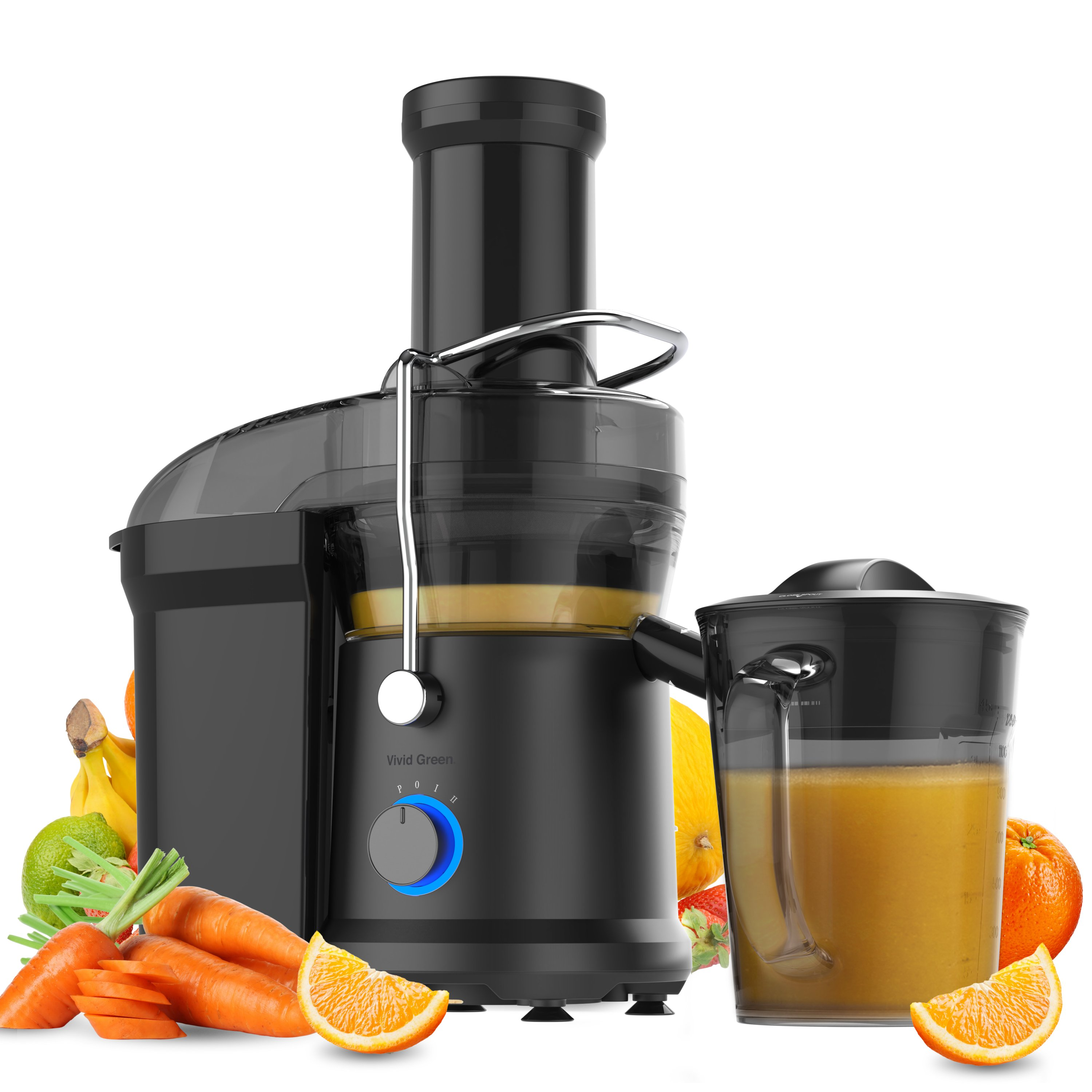 A black juicer with fruit and carrots. A pitcher of juice is next to the juicer. Oranges, bananas and lemons are nearby.