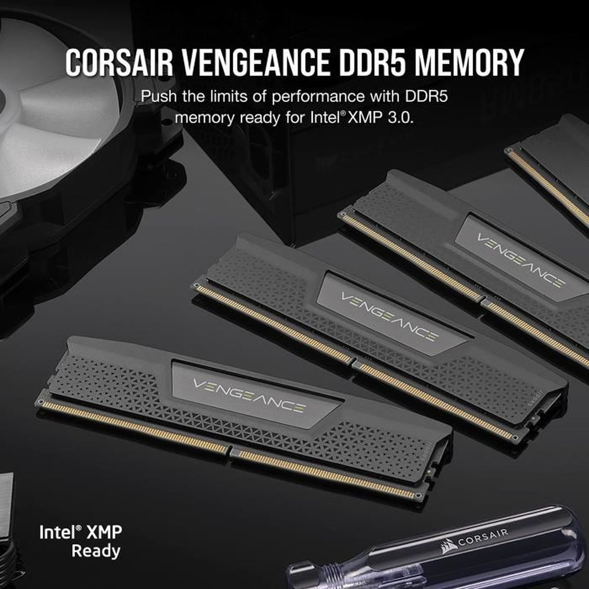 Obraz przedstawia moduły pamięci Corsair Vengeance DDR5. Są szare ze złotymi akcentami, ułożone na odblaskowej powierzchni. Tekst: Intel XMP Ready.