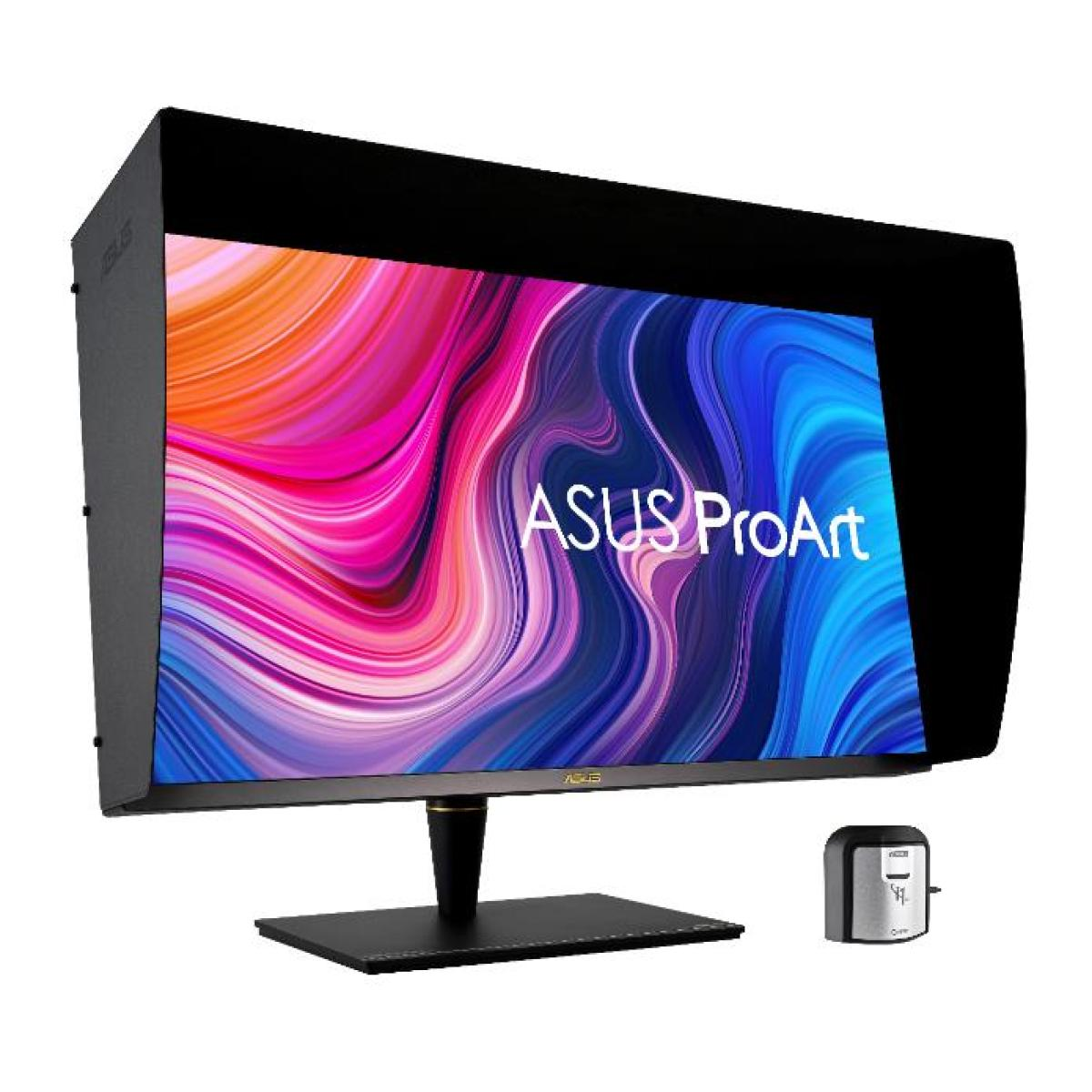 Monitor ASUS ProArt z czarnym kapturem. Ekran wyświetla kolorowy, abstrakcyjny wzór. Kalibrator znajduje się po prawej stronie.