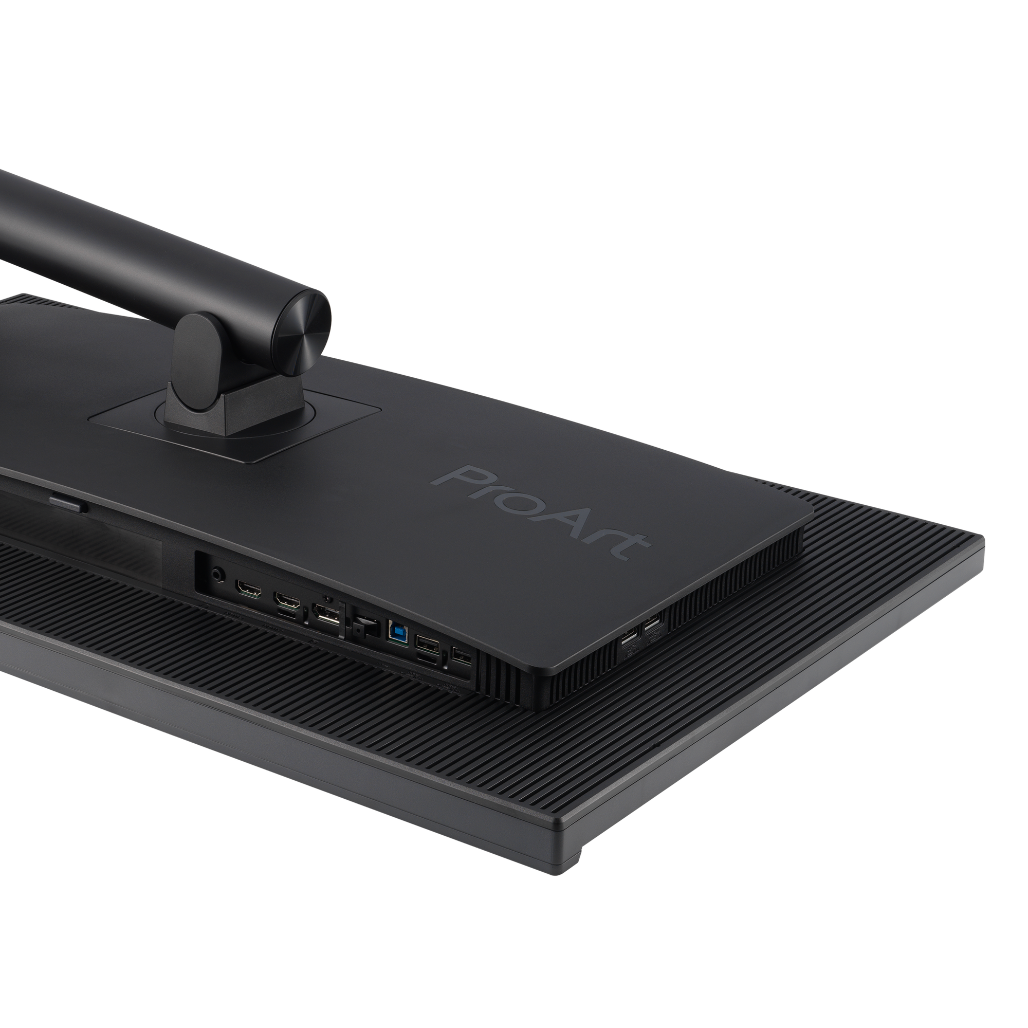 Widok z tyłu czarnego monitora ProArt. Widoczne porty, podstawa i teksturowana podstawa. Czarne tło.