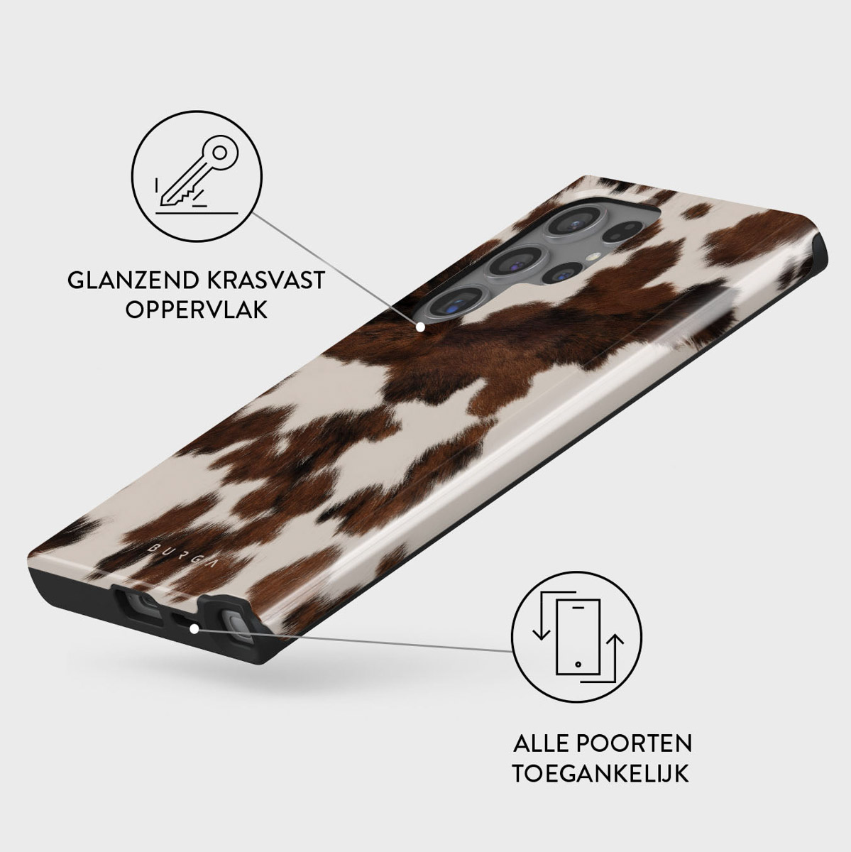 Een telefoonhoesje met een koeienhuidpatroon op een witte achtergrond, zwarte randen. De tekst zegt: glanzend krasvast oppervlak.