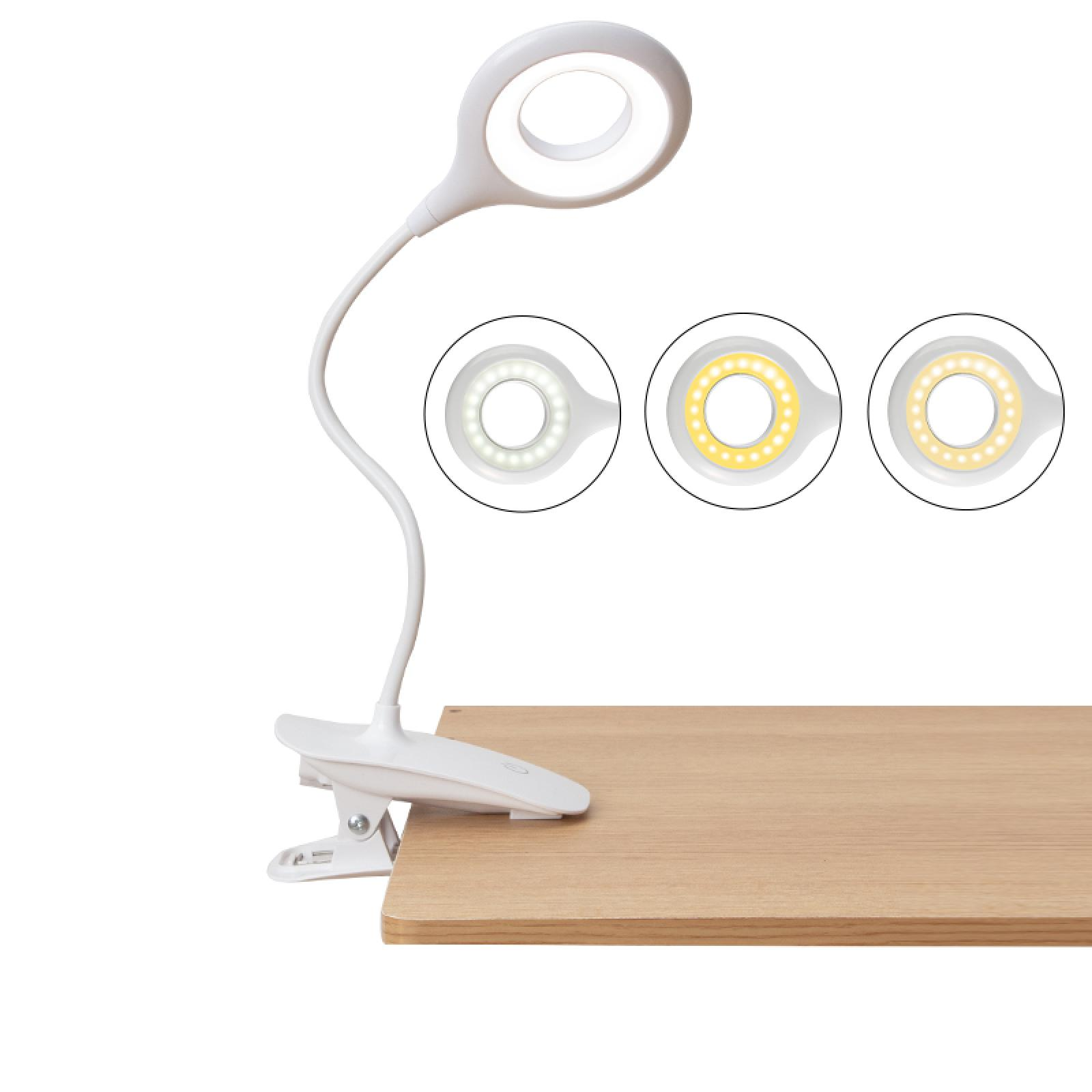 Eine weiße LED-Schreibtischlampe mit Clip-Basis. Es werden drei Lichtfarboptionen gezeigt. Die Lampe steht auf einem Holzschreibtisch.