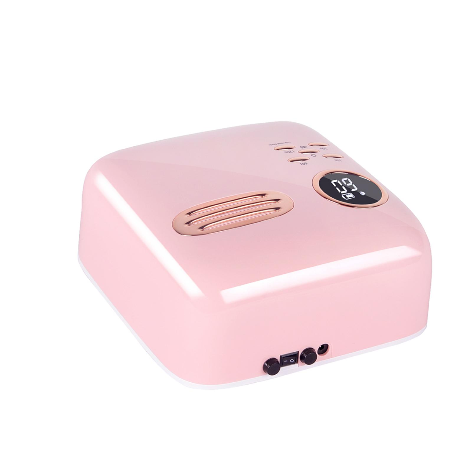 Ein rosa Nageltrockner mit Digitalanzeige. Er hat Knöpfe und ein Lüftungsgitter. Der Hintergrund ist weiß.