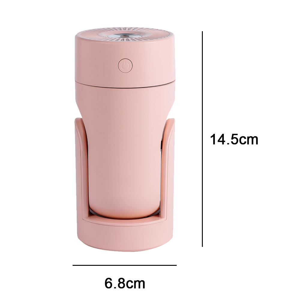 Ein rosa Luftbefeuchter mit den Maßen 14,5 cm Höhe und 6,8 cm Breite. Er hat einen Einschaltknopf und ein Design mit gebogenen Stützen.