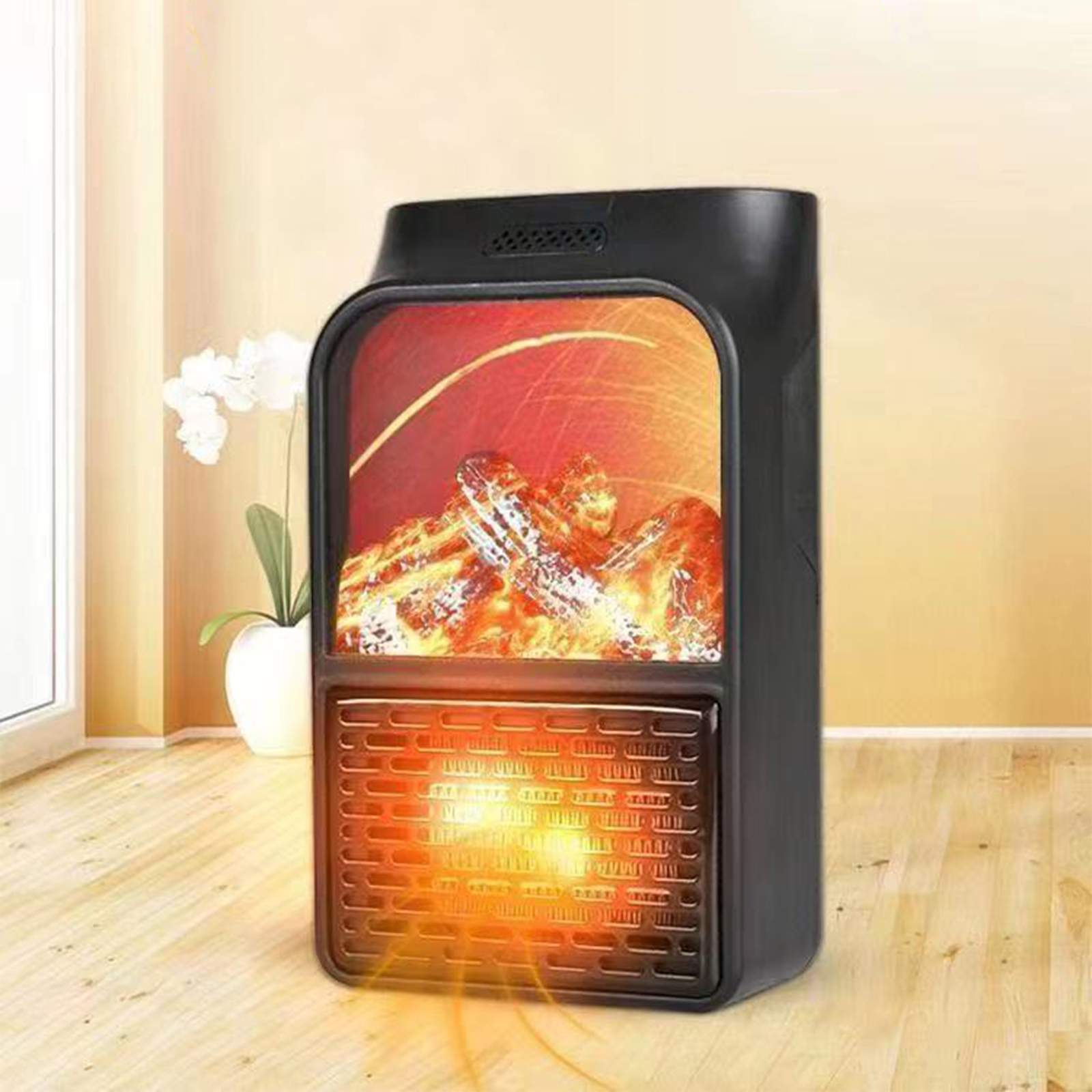 Ein schwarzer elektrischer Kamin mit Flammeneffekt. Holzboden und eine Pflanze im Hintergrund.