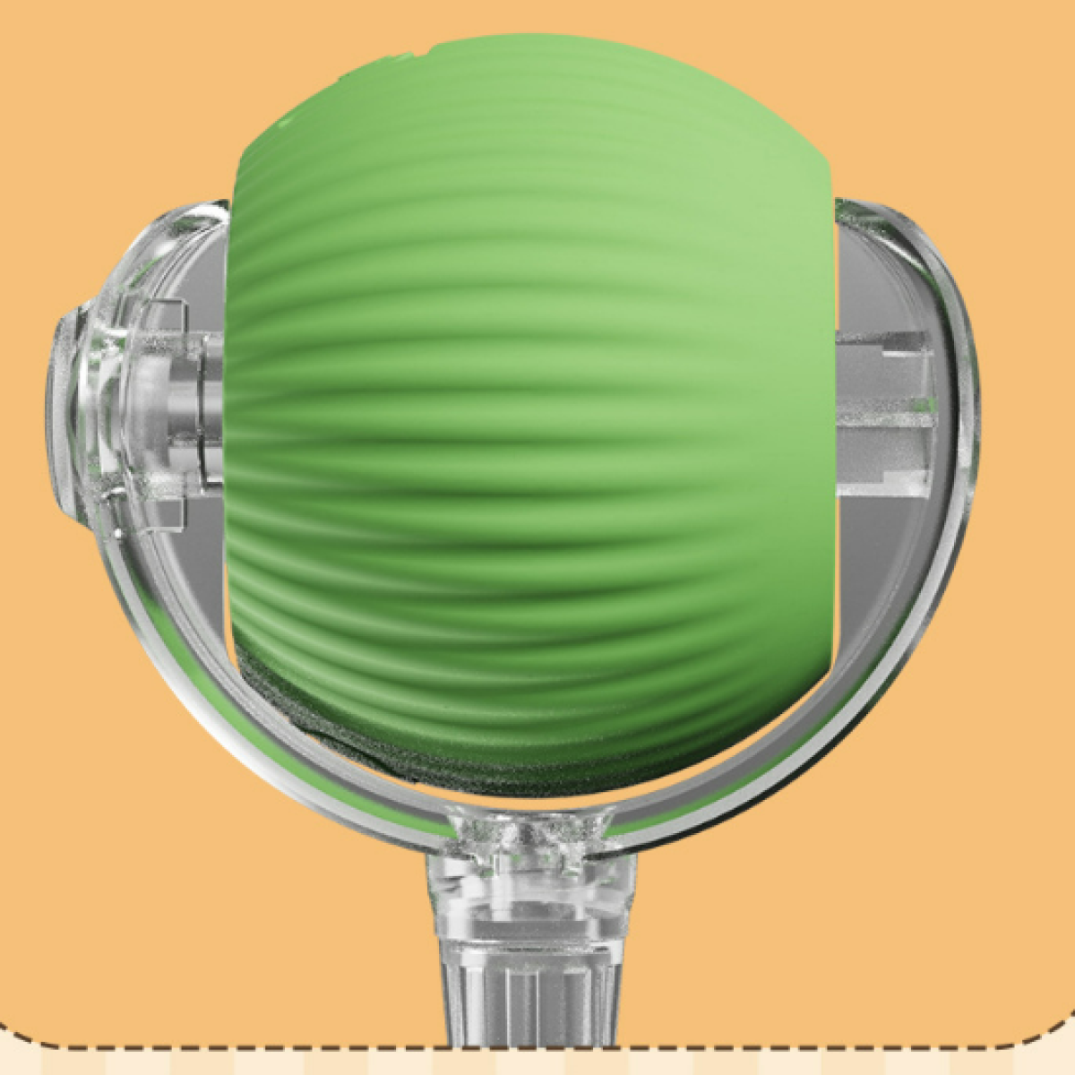 Primer plano de un objeto cilíndrico verde dentro de un marco transparente. El fondo es naranja. El objeto tiene una textura acanalada.