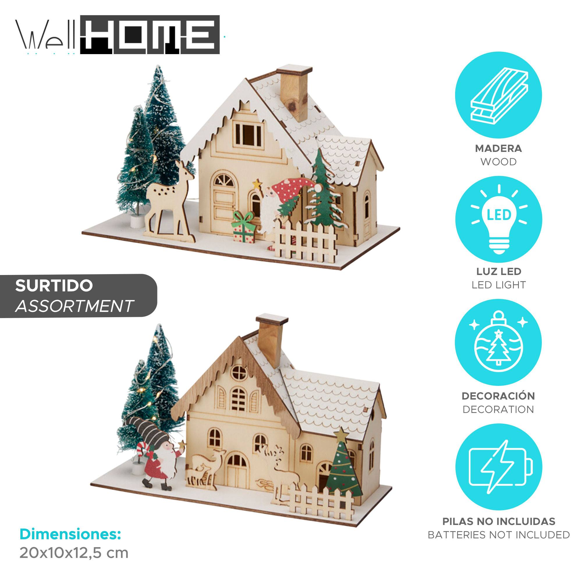 Casa navideña de madera con árboles, Papá Noel, ciervos y una cerca. El texto incluye 'Well HOME' y 'Assortment'.