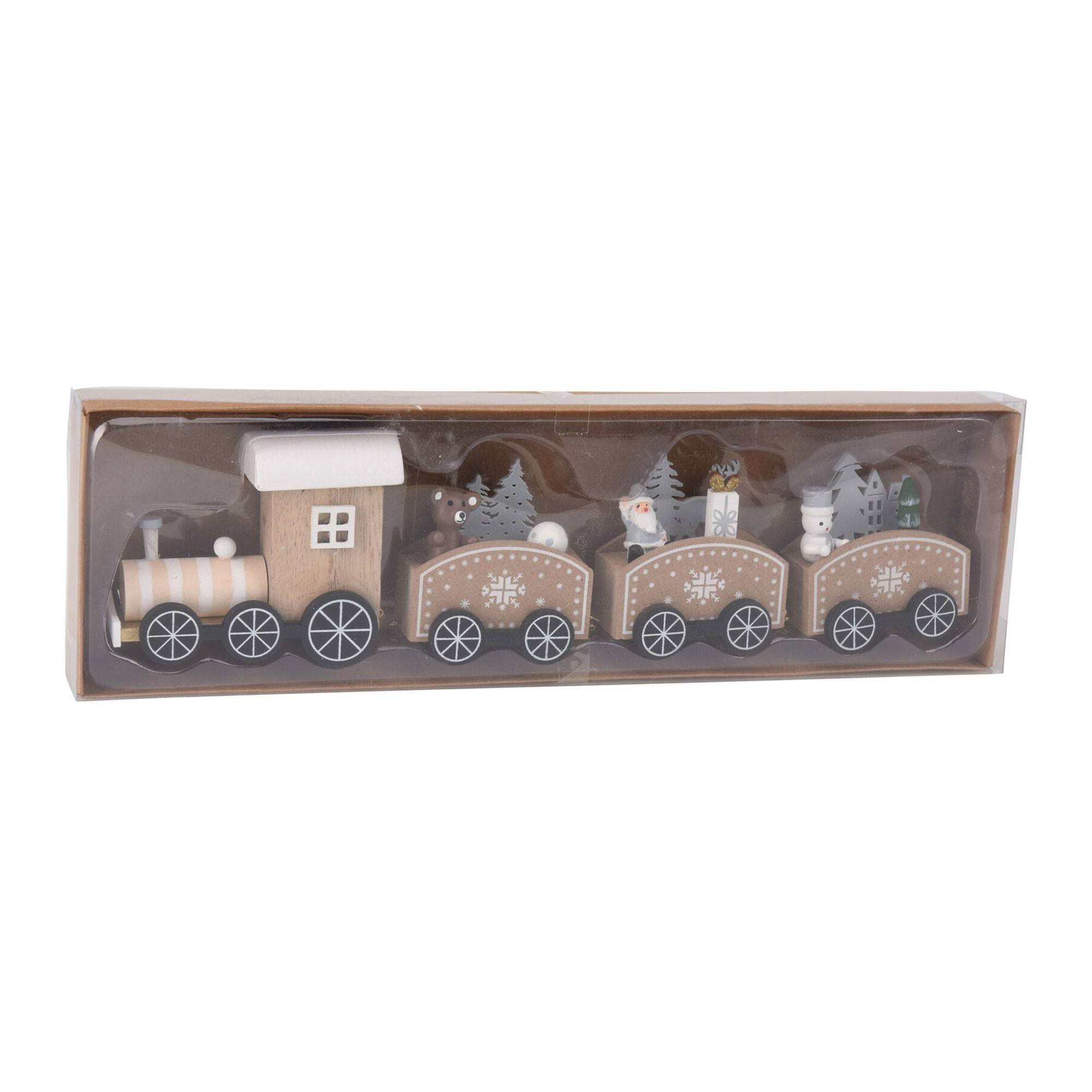 Tren de Navidad de madera en una caja. Tiene una locomotora y tres vagones con adornos.