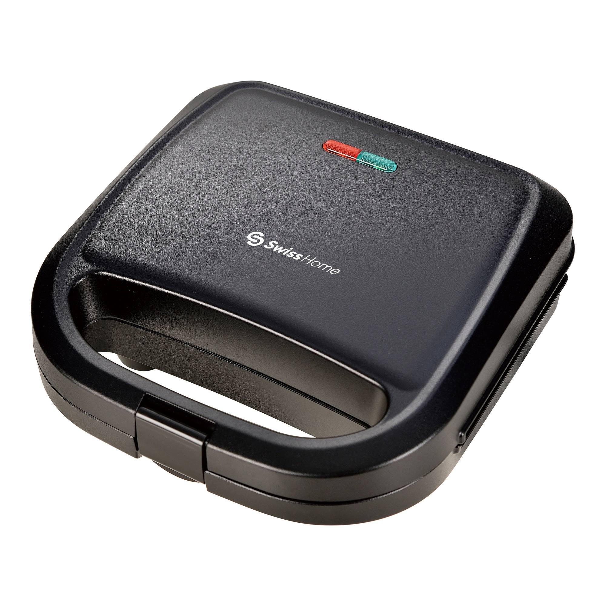 Wafflera negra Swiss Home. Tiene luces indicadoras rojas y verdes, un asa y el logo de la marca.
