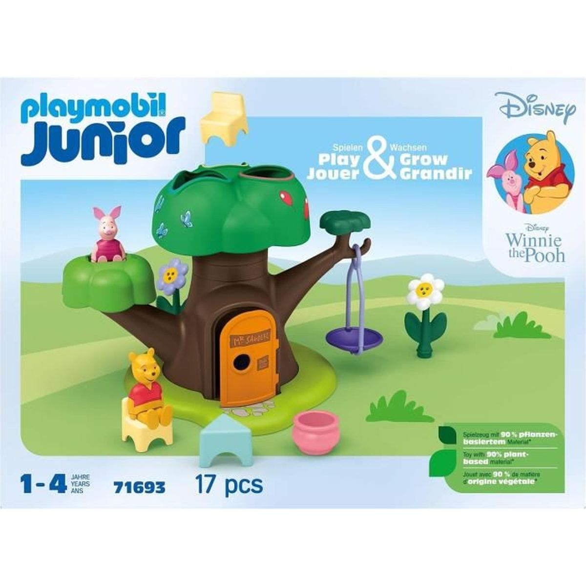 Un set di giocattoli di Winnie the Pooh. Include una casa sull'albero, le figure di Pooh e Piglet, un'altalena, un fiore e una sedia. Colori verde e marrone.