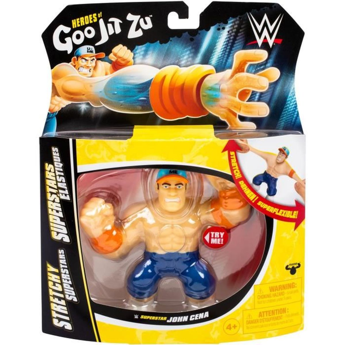 Eine John Cena Actionfigur in einer Box. Es ist ein dehnbares Spielzeug mit blauer Hose, einer Kappe und orangen Handschuhen. Auf der Box steht 'Heroes of Goo Jit Zu'.