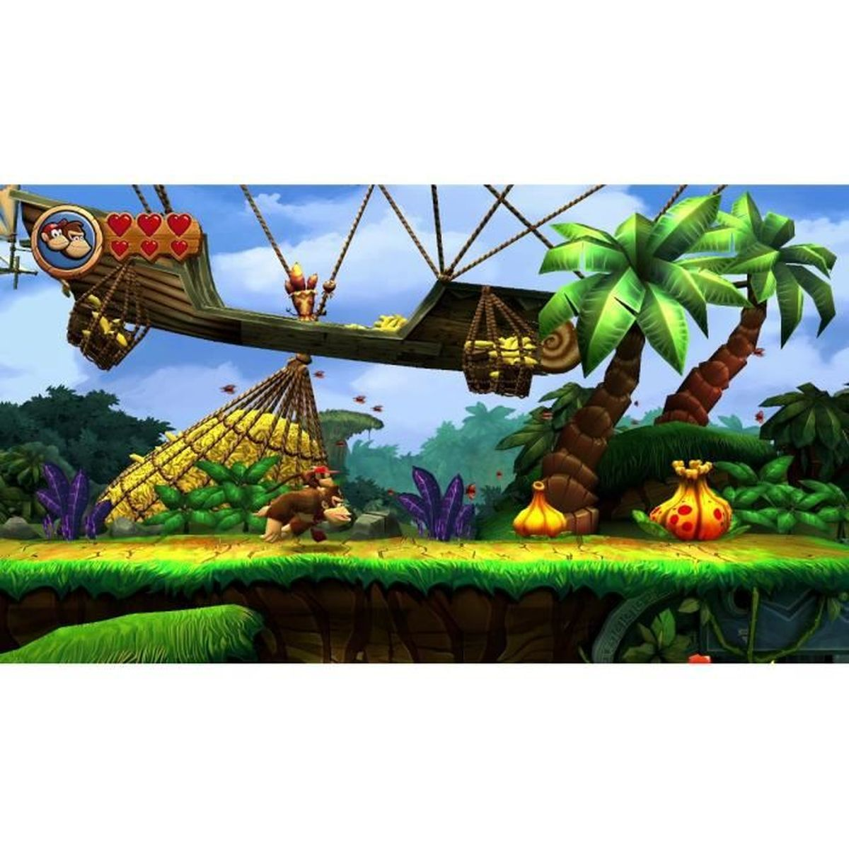 Scena z gry Donkey Kong. DK biegnie po zielonej platformie, drewniany statek z ładunkiem bananów i tropikalny krajobraz.