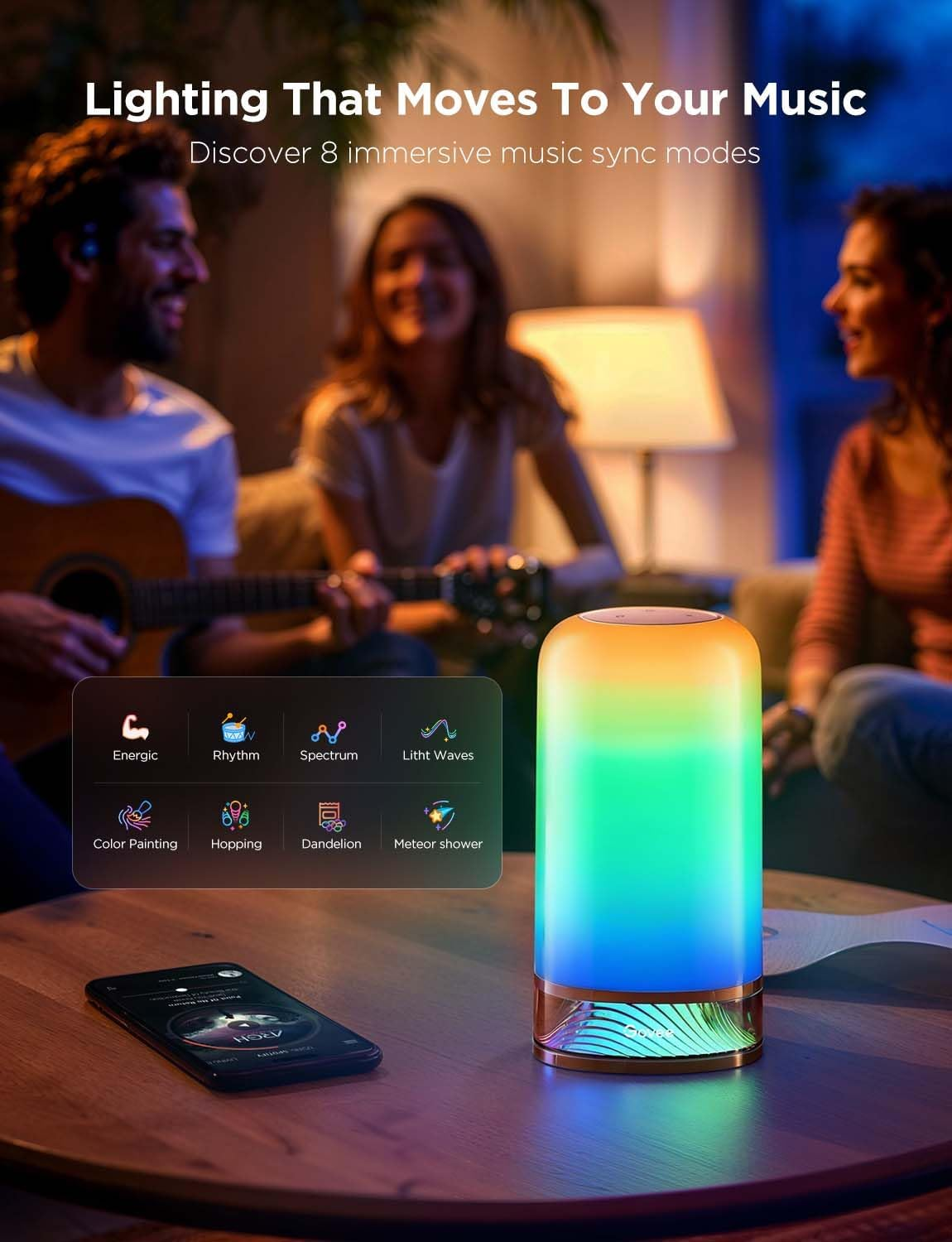 Une lampe colorée sur une table avec un téléphone. Des personnes sont en arrière-plan. Texte : L'éclairage qui accompagne votre musique.