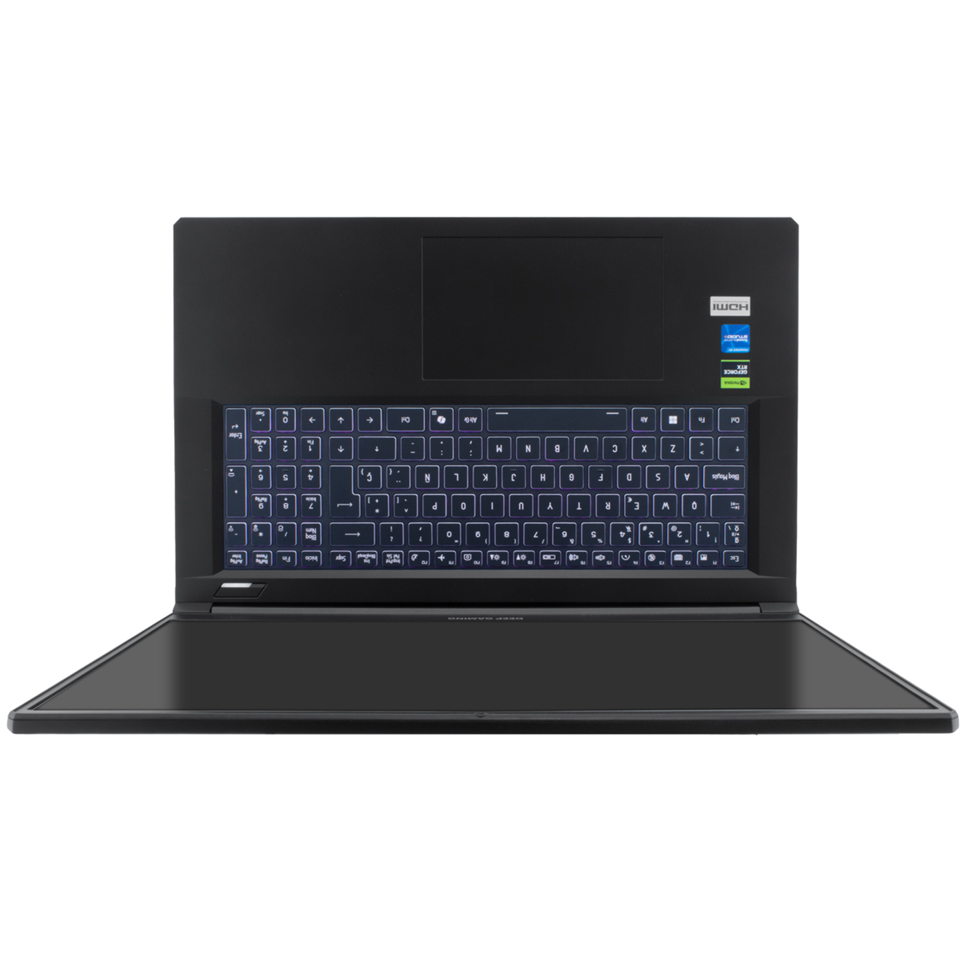 Un portátil negro está abierto, mostrando un teclado retroiluminado y una pantalla. El portátil está sobre una superficie blanca.