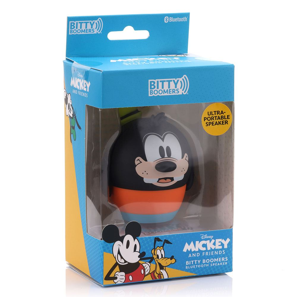 Een Mickey Mouse-vormige luidspreker in een doos. De doos is blauw en geel, met Mickey en Pluto. De luidspreker heeft zwart, oranje en blauw.