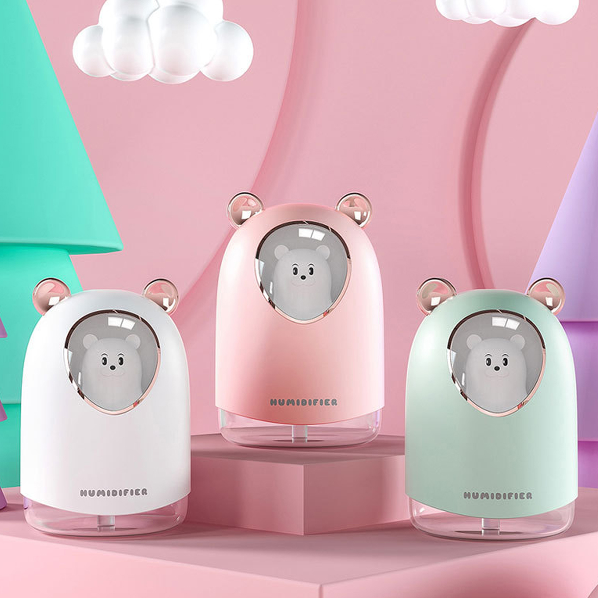 Drei bärenförmige Luftbefeuchter in Weiß, Rosa und Mintgrün. Jeder hat ein Bärengesicht und das Wort 'HUMIDIFIER'.