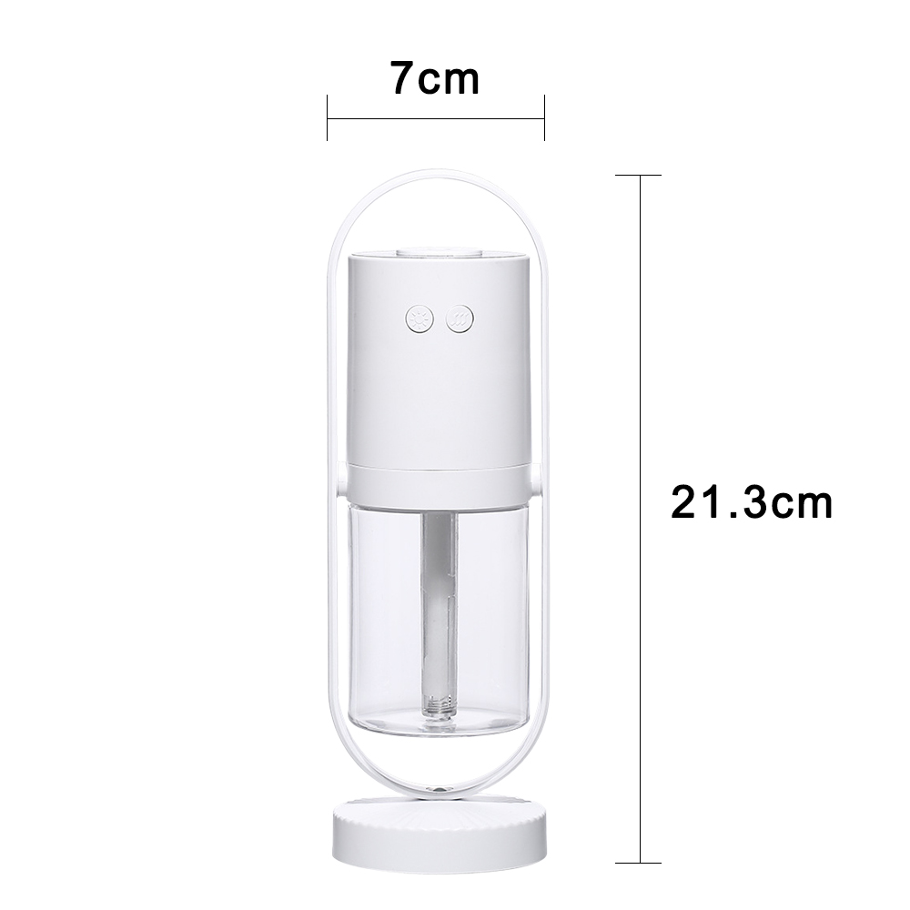 Ein weißer Luftbefeuchter mit einem durchsichtigen Wassertank. Maße: 7 cm breit, 21,3 cm hoch. Zwei Knöpfe oben.