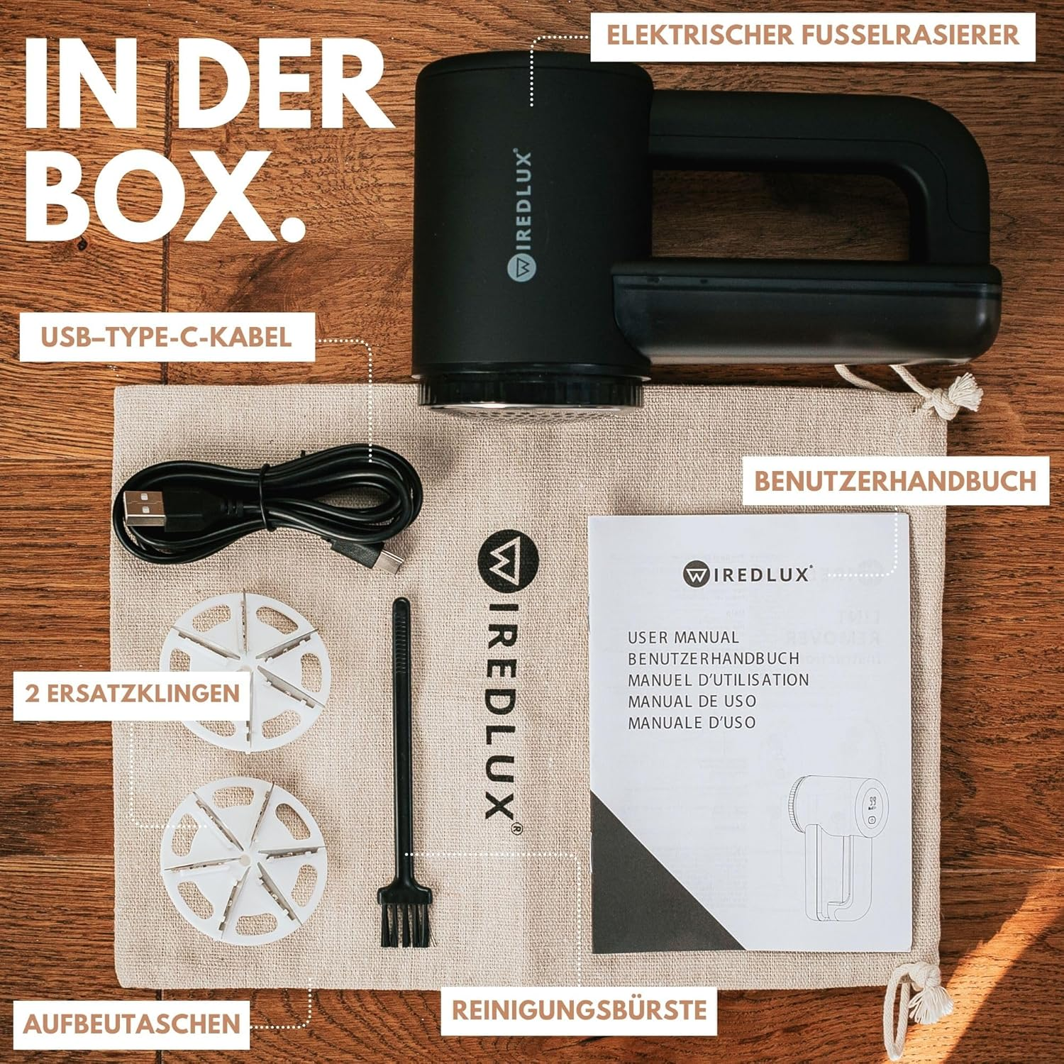 Das Bild zeigt ein Fußrasierer-Kit mit Rasierer, USB-Kabel, Ersatzklingen, Bürste, Benutzerhandbuch und Aufbewahrungstasche.