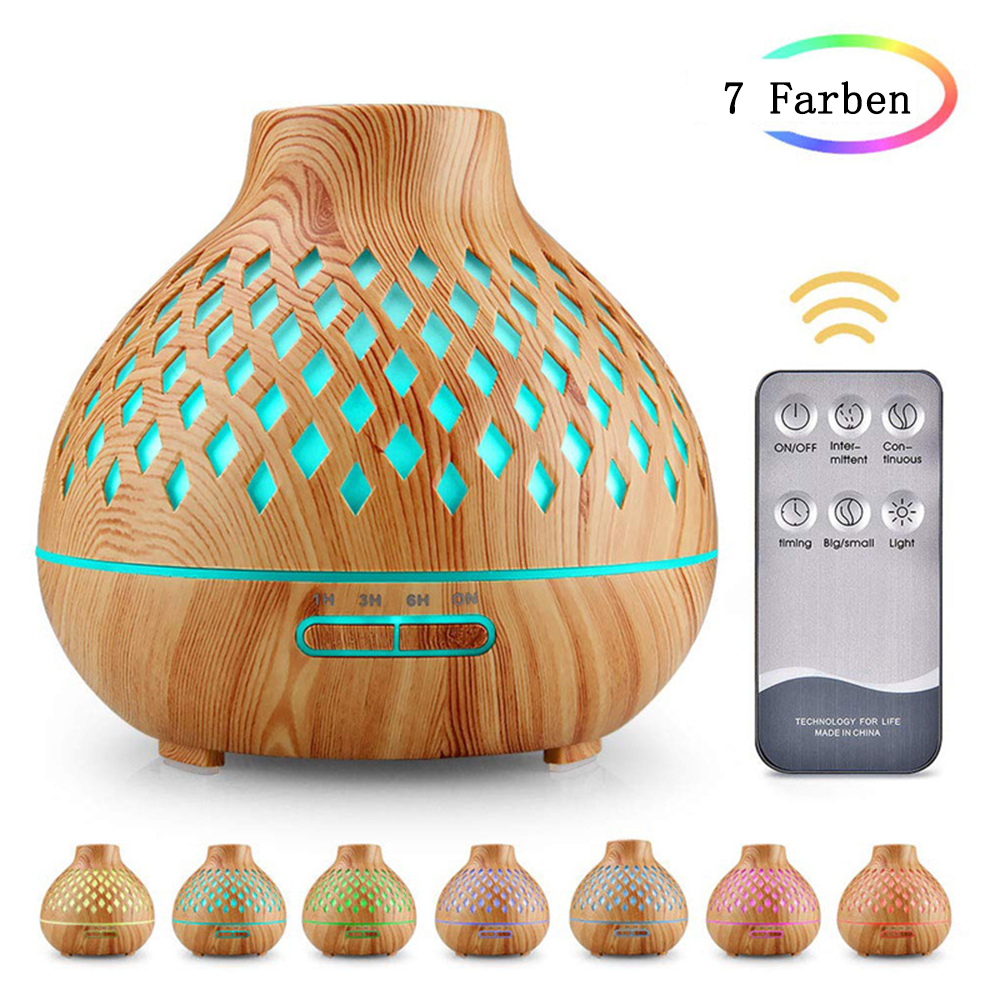 Ein hölzerner Diffusor mit Diamantausschnitten, Fernbedienung und Regenbogenfarbenanzeige. Sieben Farben sind verfügbar.