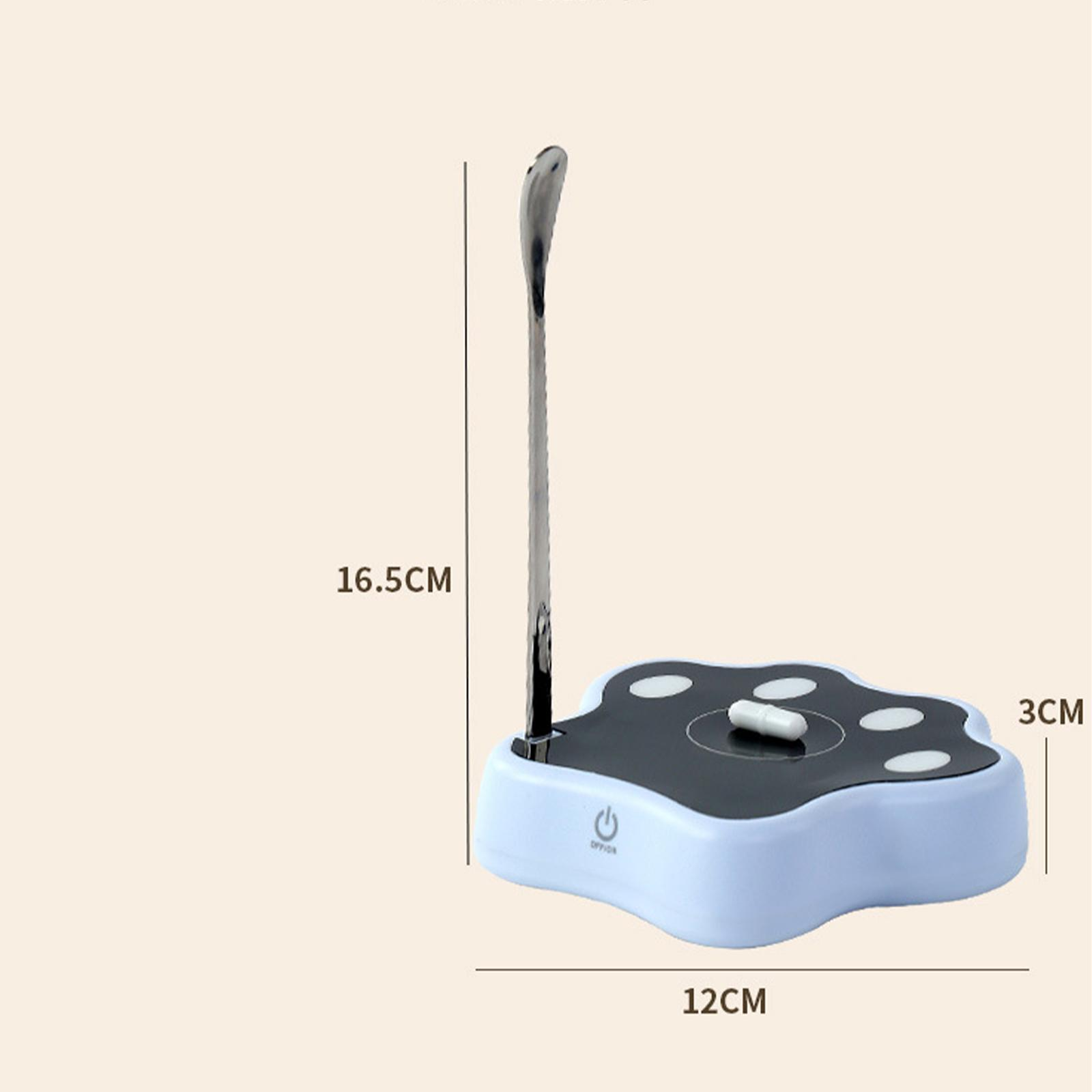 Ein weißes pfotenförmiges Gerät mit einem Metalllöffel, die Abmessungen sind mit 16,5 cm, 12 cm und 3 cm angegeben. Es hat einen Ein-/Ausschalter.
