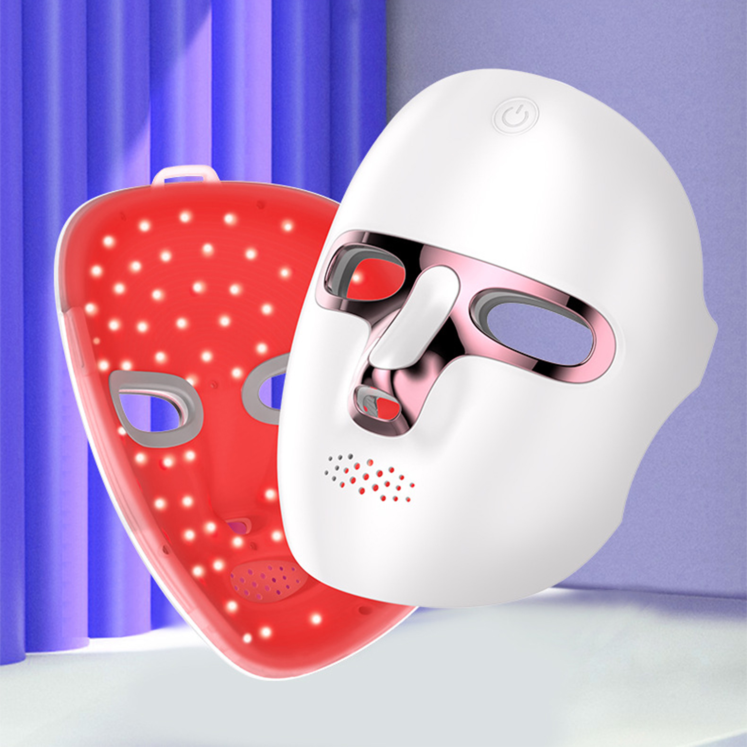 Zwei LED-Gesichtsmasken, eine weiße und eine rote, vor einem lila Hintergrund. Die rote Maske hat viele kleine Lichter.