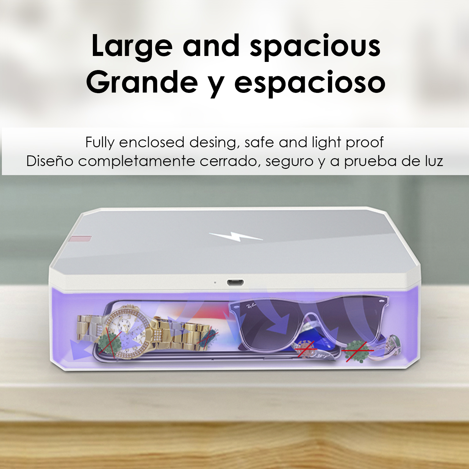 Una scatola bianca con oggetti all'interno, tra cui un orologio e occhiali da sole, sotto una luce viola. Testo sopra: 'Large and spacious'.