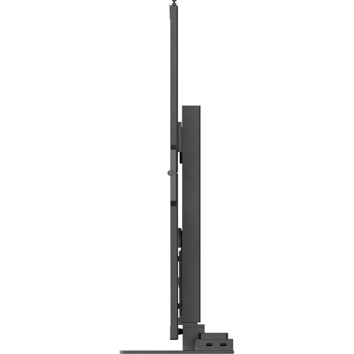 Widok z boku ciemnoszarego interaktywnego ekranu. Stoi pionowo z podstawą. Kable są widoczne na dole.