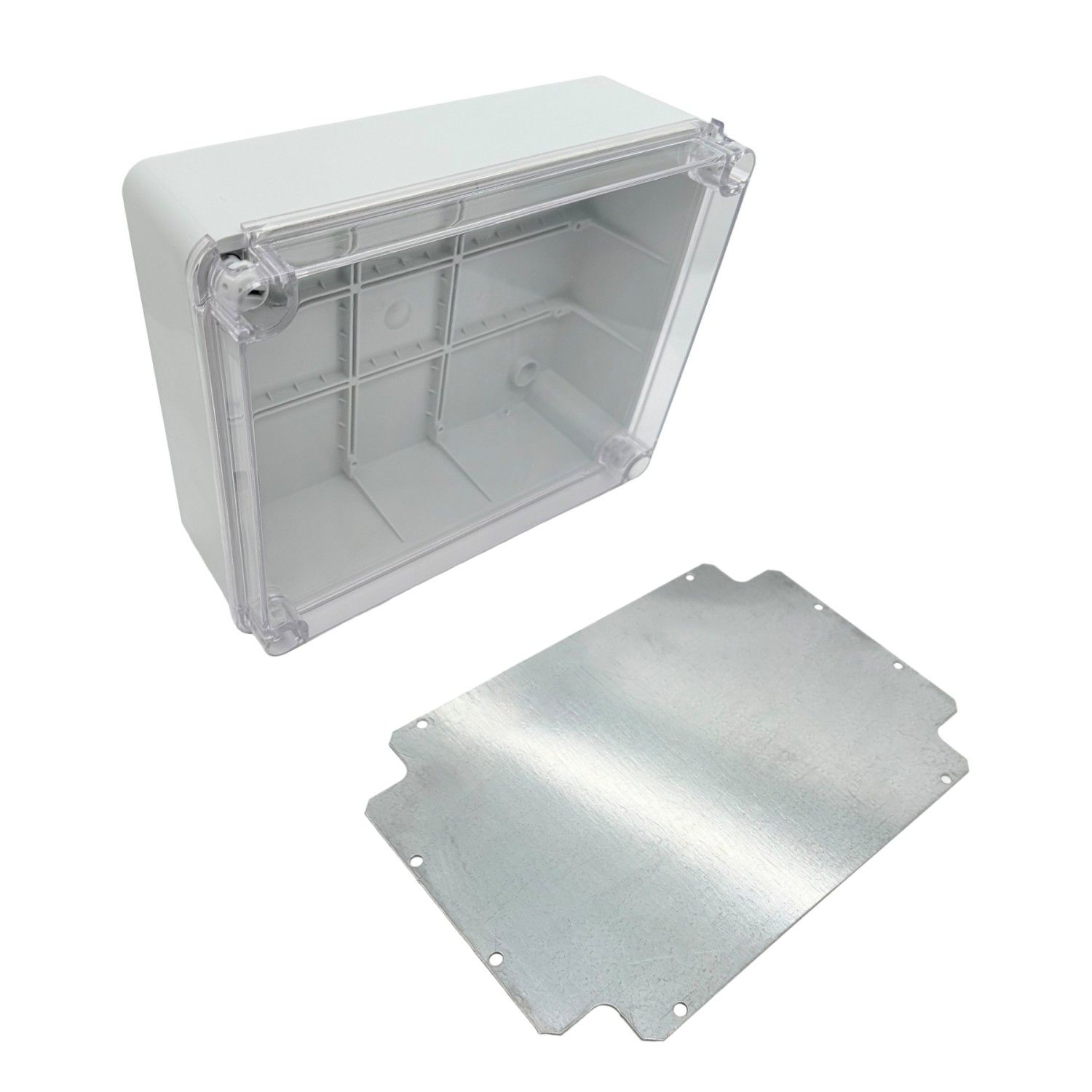 Eine weiße elektrische Kunststoffbox mit transparentem Deckel und separater Metallplatte. Die Box ist offen und leer.