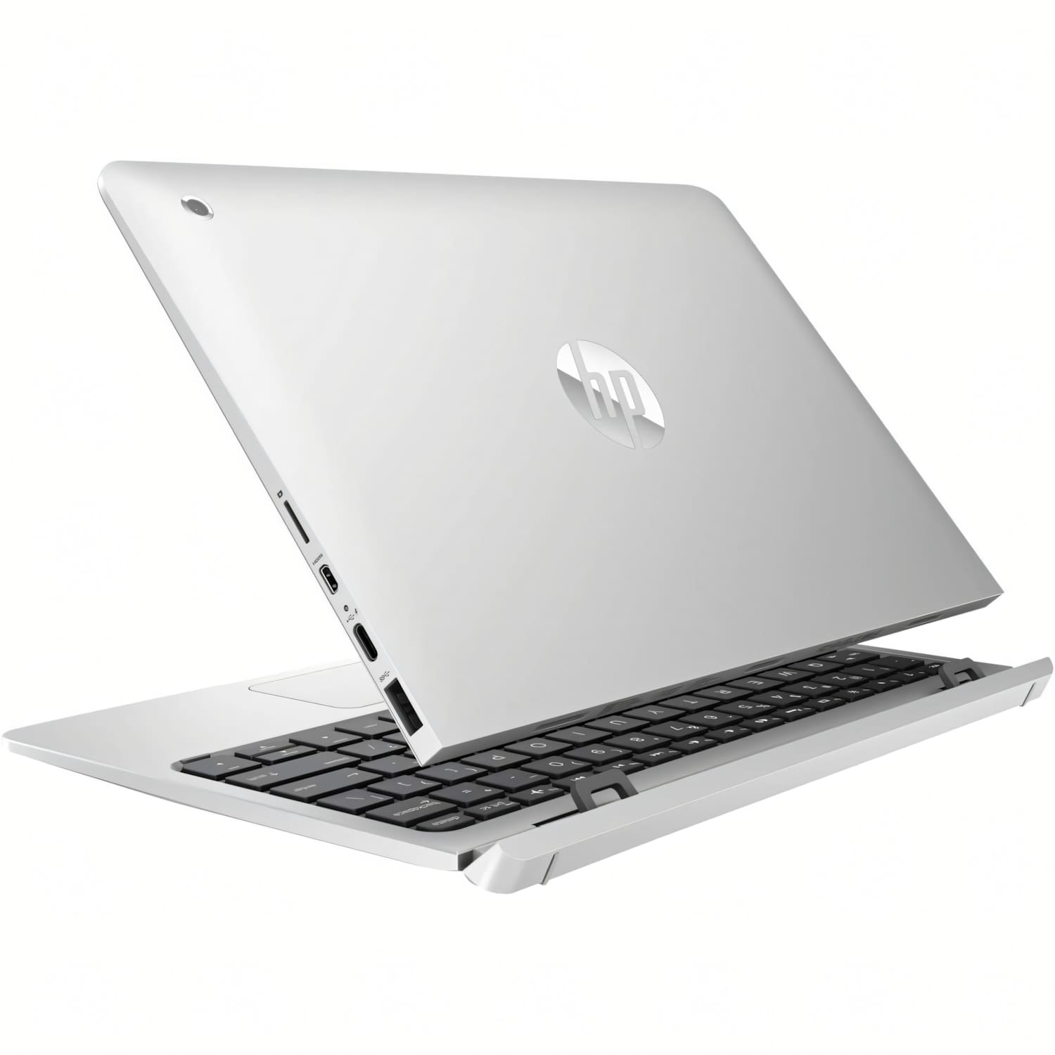 Un portátil HP plateado está abierto. La pantalla está inclinada hacia atrás, revelando un teclado negro. El logo de HP es visible.