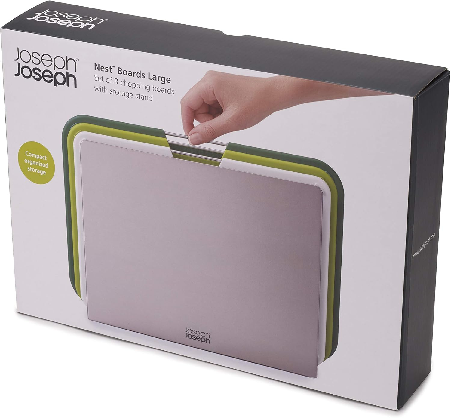 Una caja con Joseph Joseph Nest Boards Large. Muestra una mano sosteniendo las tablas. La caja es blanca y gris.