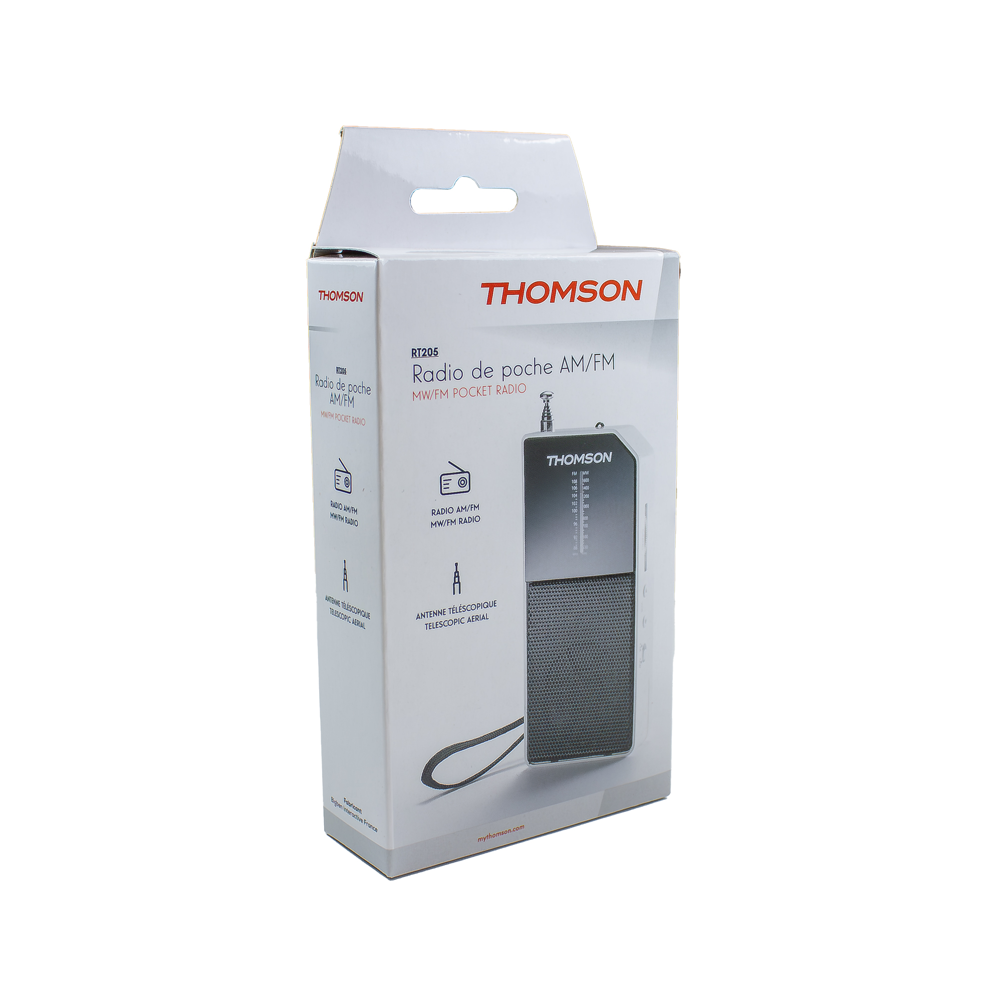 Una caja blanca con una radio Thomson dentro. La caja tiene texto e imágenes de la radio.