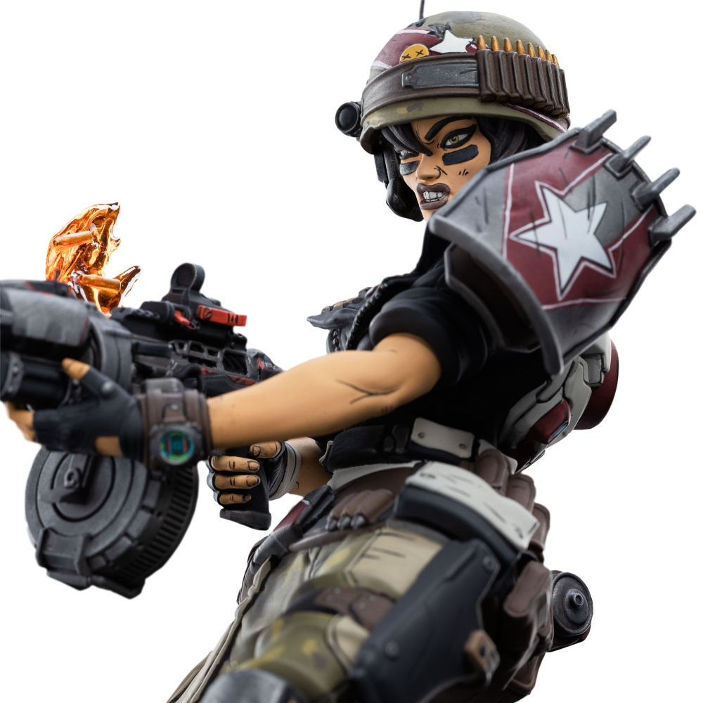 Eine weibliche Soldatenfigur mit Gewehr, Helm und Rüstung. Sie hat einen wütenden Gesichtsausdruck und hält eine Waffe.
