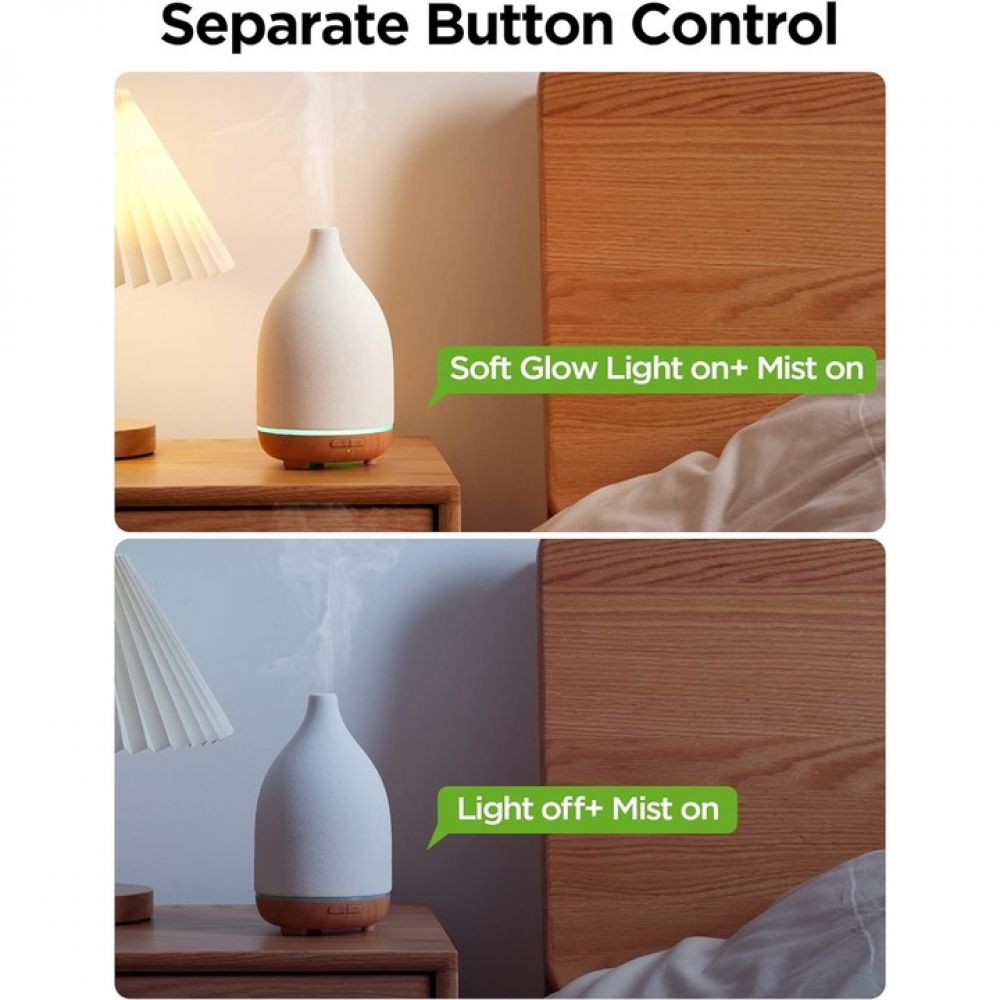 Das Bild zeigt einen Diffusor für ätherische Öle mit separater Licht- und Nebelsteuerung. Der Diffusor steht auf einem Nachttisch mit einer Lampe.