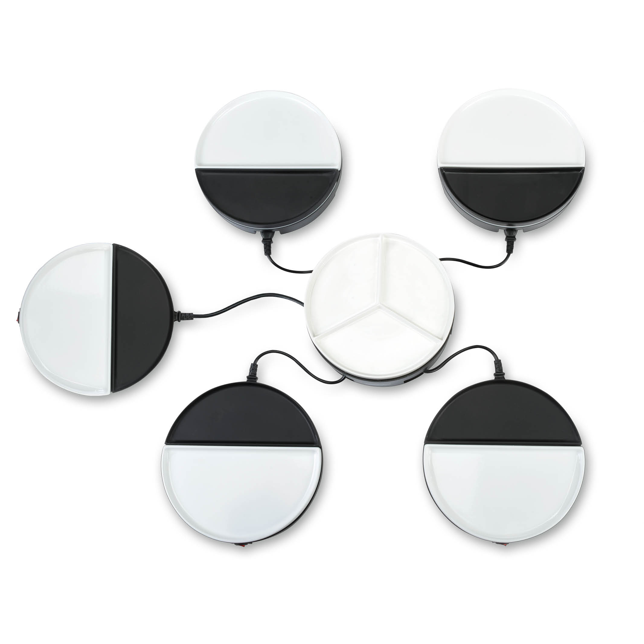 Circular lamps connected to a central unit. Each lamp has a white and black half. White background.