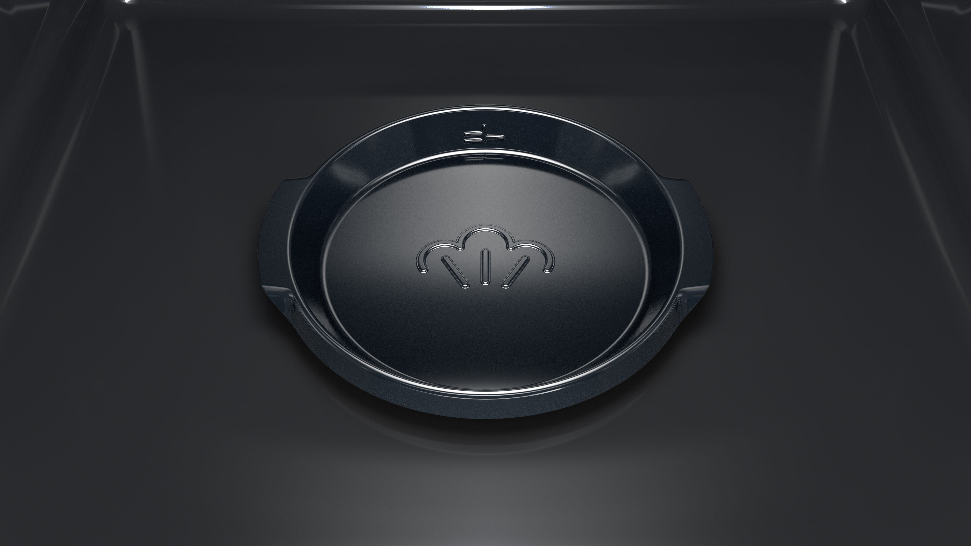 Een close-up van een donker, metalen ovenelement. Kenmerken zijn een cirkelvormig ontwerp met een stoom symbool en niveau-indicatoren. De achtergrond is donker.