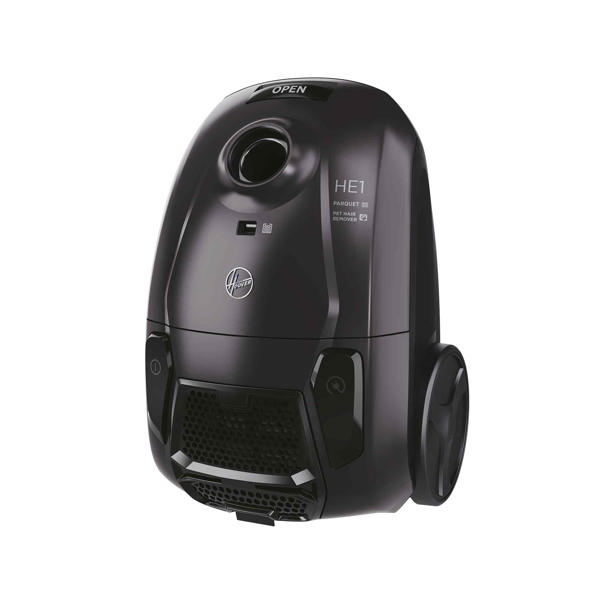 Czarny odkurzacz Hoover HE1. Ma zaokrąglony kształt, siatkowy przód i dwa koła. Posiada przycisk 'otwórz'.