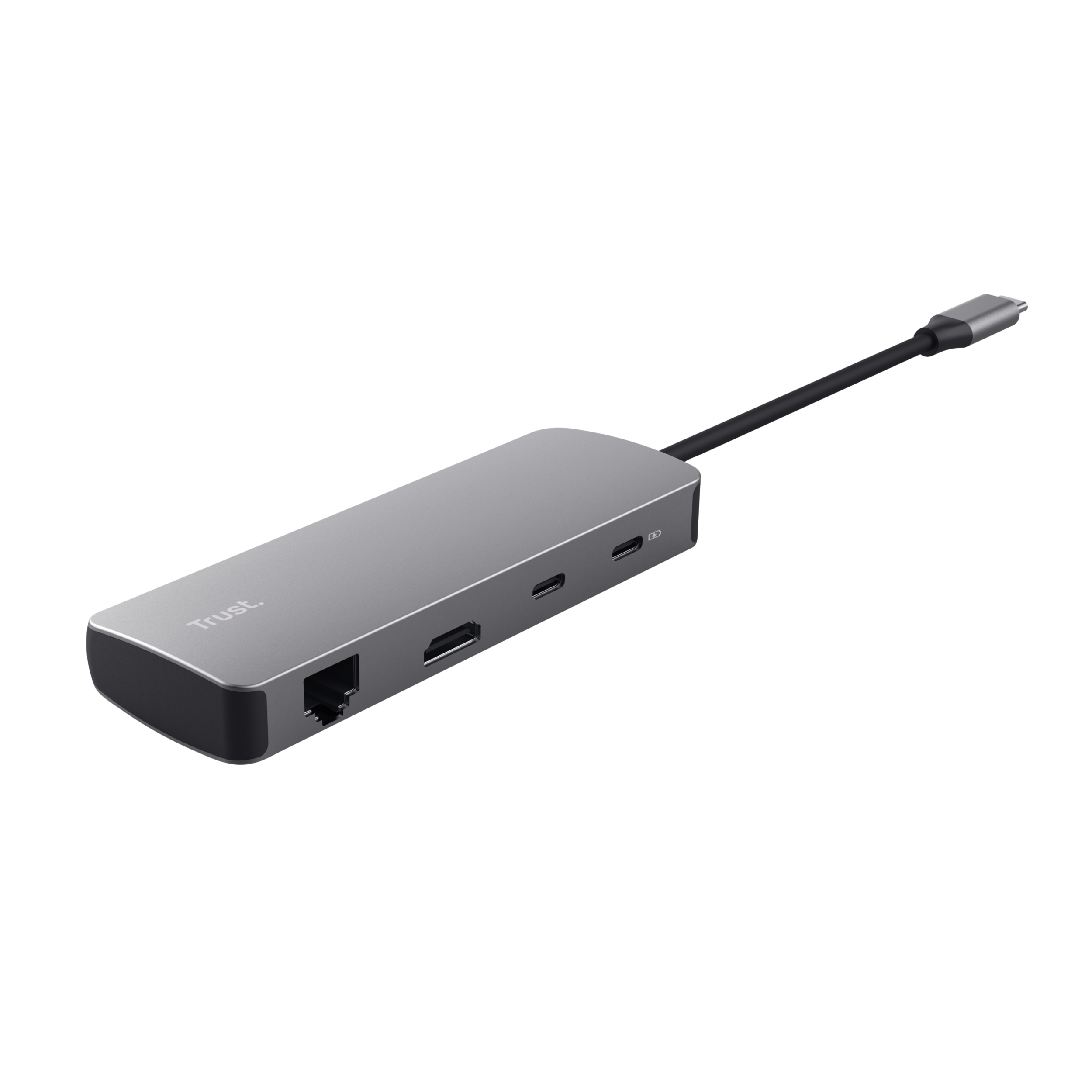 Een zilveren Trust USB-C-hub met meerdere poorten, een zwarte kabel en een USB-C-connector, op zwarte achtergrond.