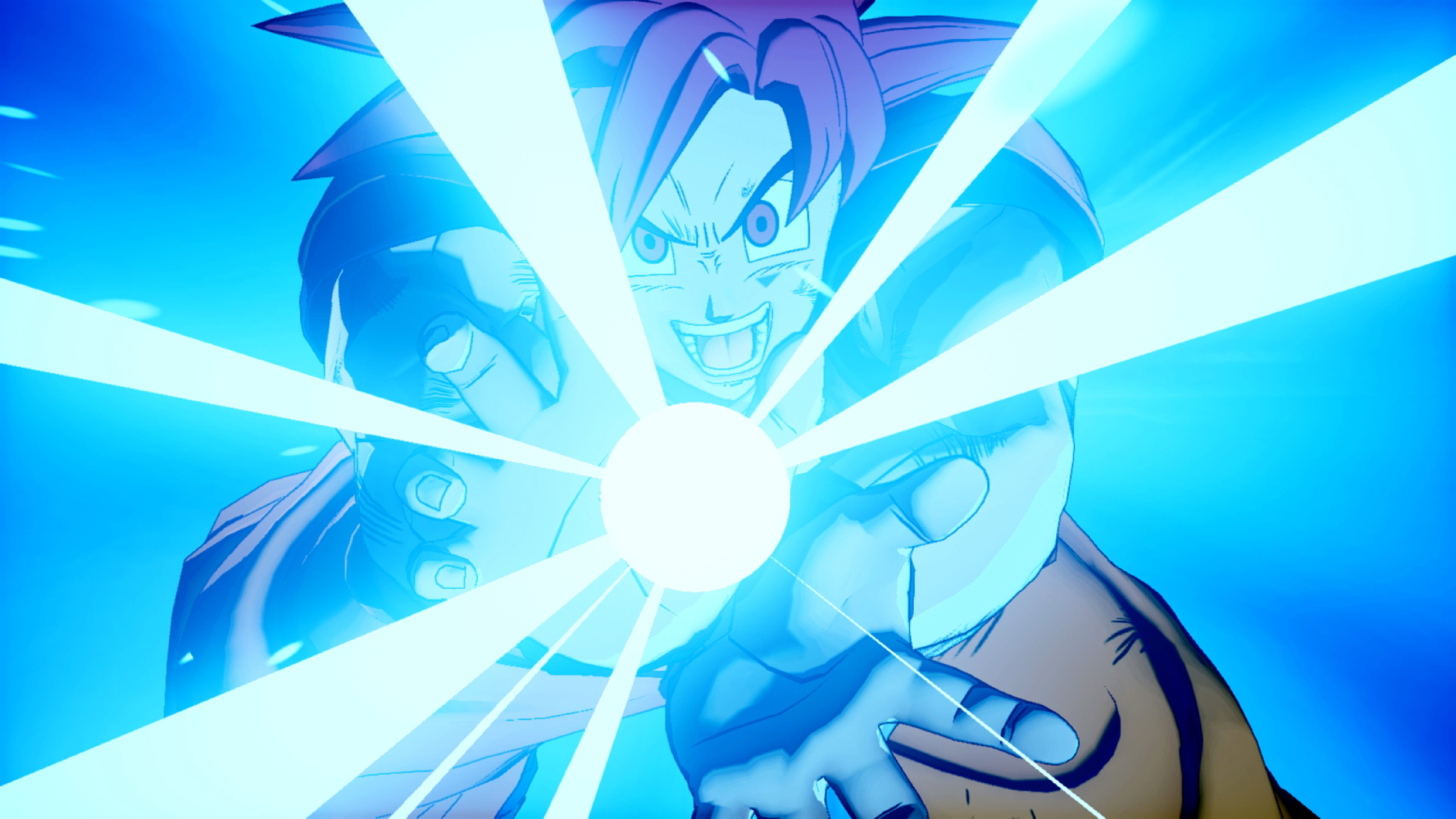 Un personaggio con i capelli a punta sta caricando un'esplosione di energia. Una luce blu brillante emana dalle mani del personaggio, formando una sfera.