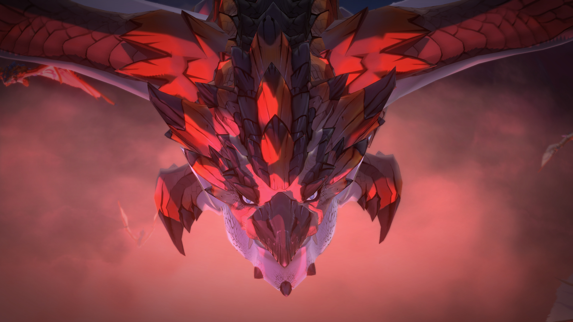 Ein Drache mit roten und schwarzen Schuppen wird von unten gegen einen roten Himmel betrachtet. Kopf und Flügel des Drachen sind im Fokus.