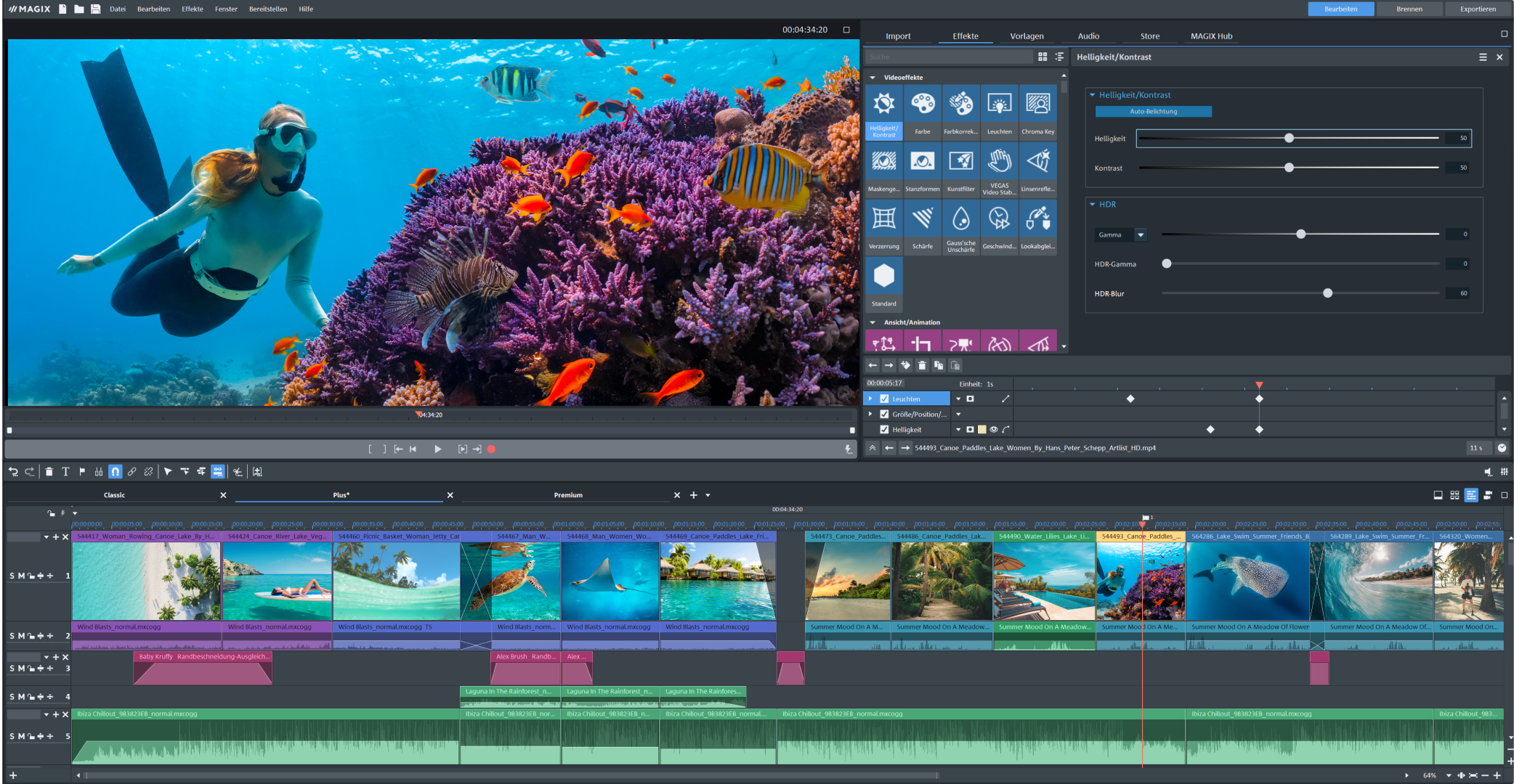 Un subacqueo nuota vicino a coralli e pesci. L'interfaccia del software di editing è visibile.