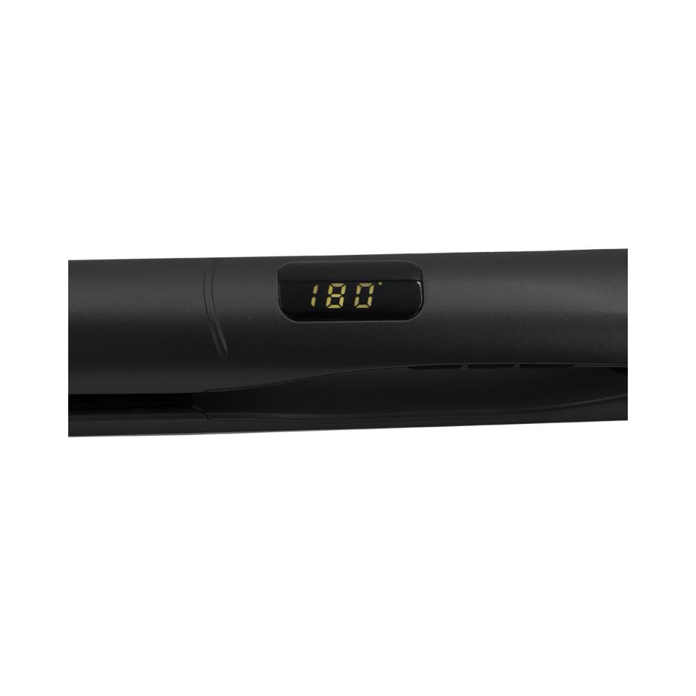 Primer plano de una plancha de pelo negra, mostrando la pantalla digital con el número 180. El fondo está borroso.