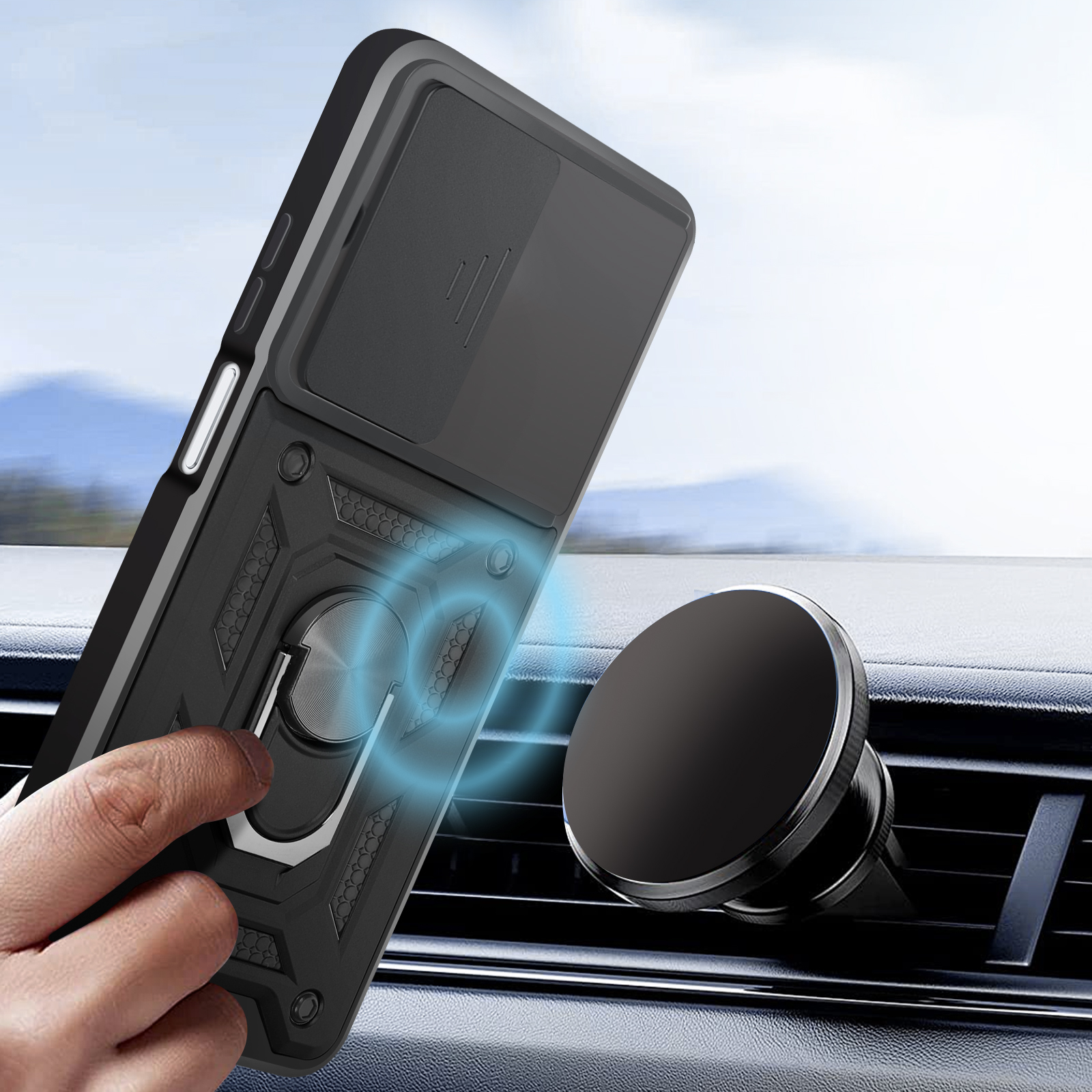 Una custodia per telefono con un anello di supporto attaccato a un supporto per telefono per bocchetta dell'auto, su uno sfondo sfocato.