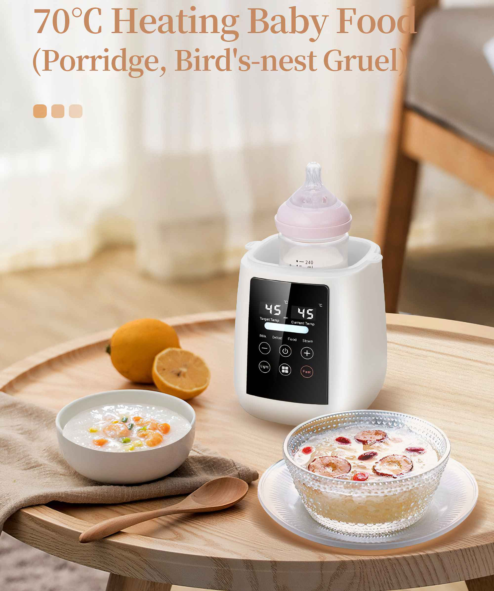 Das Bild zeigt einen Babykostwärmer mit Flasche, zwei Schalen mit Essen und eine halbierte Orange auf Holz.